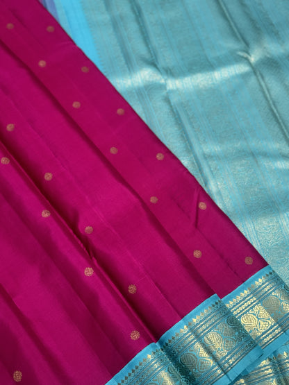 A Masterpiece kanchivaram korvai silk saree in deep amaranth pink with seablue