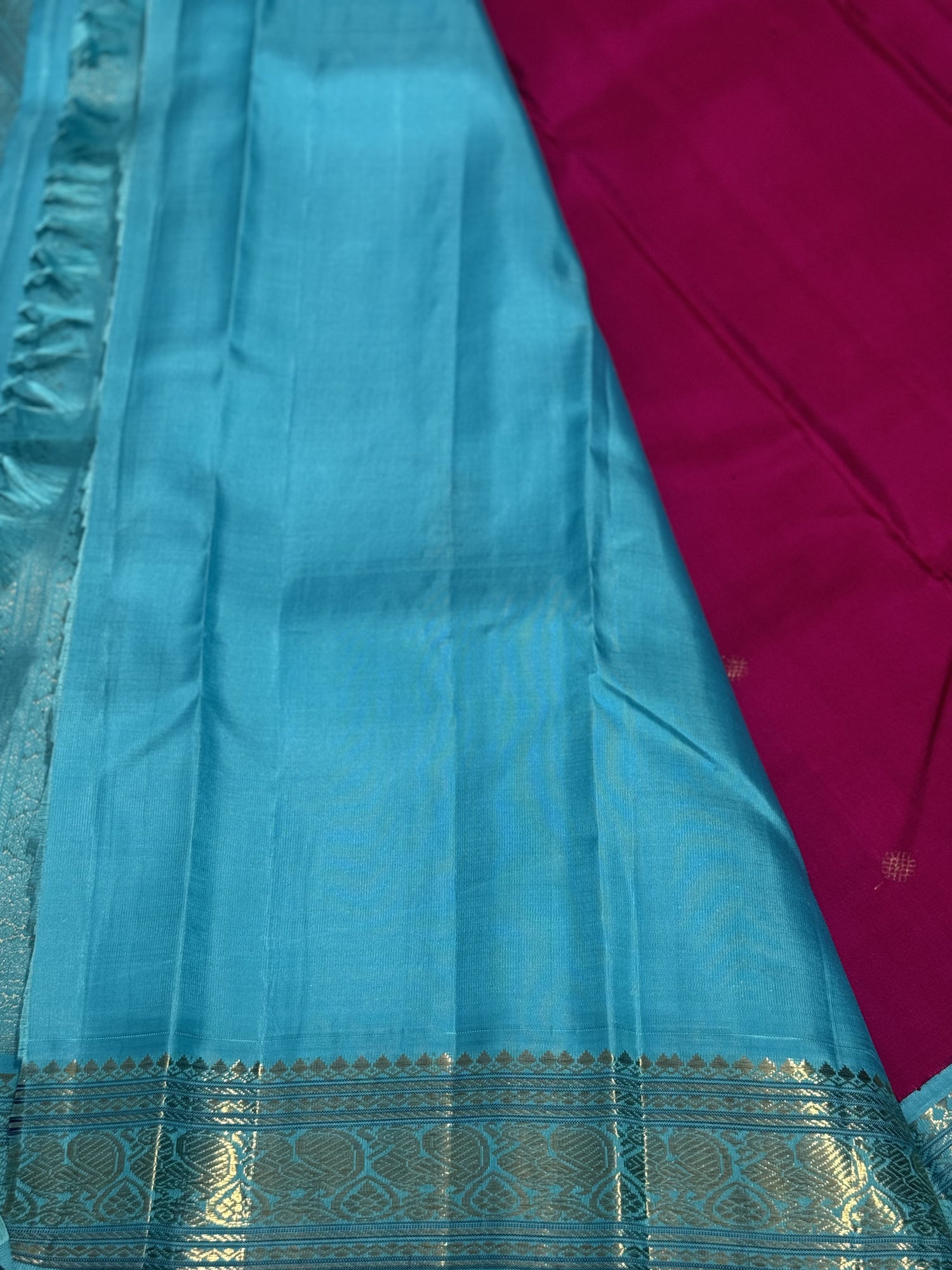 A Masterpiece kanchivaram korvai silk saree in deep amaranth pink with seablue