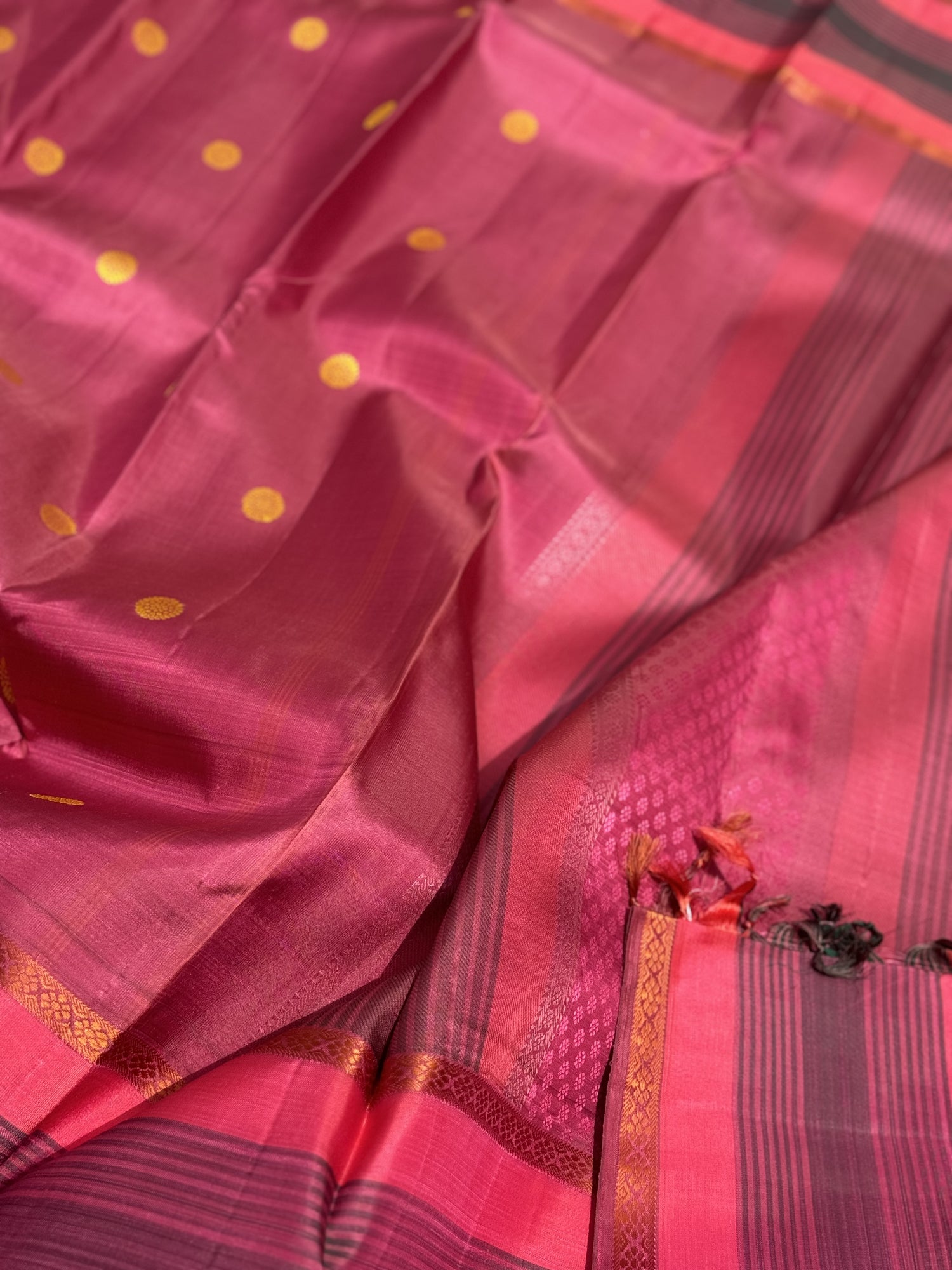 A Masterpiece no zari kanchivaram silk saree in a gorgeous mauve pink with yellow