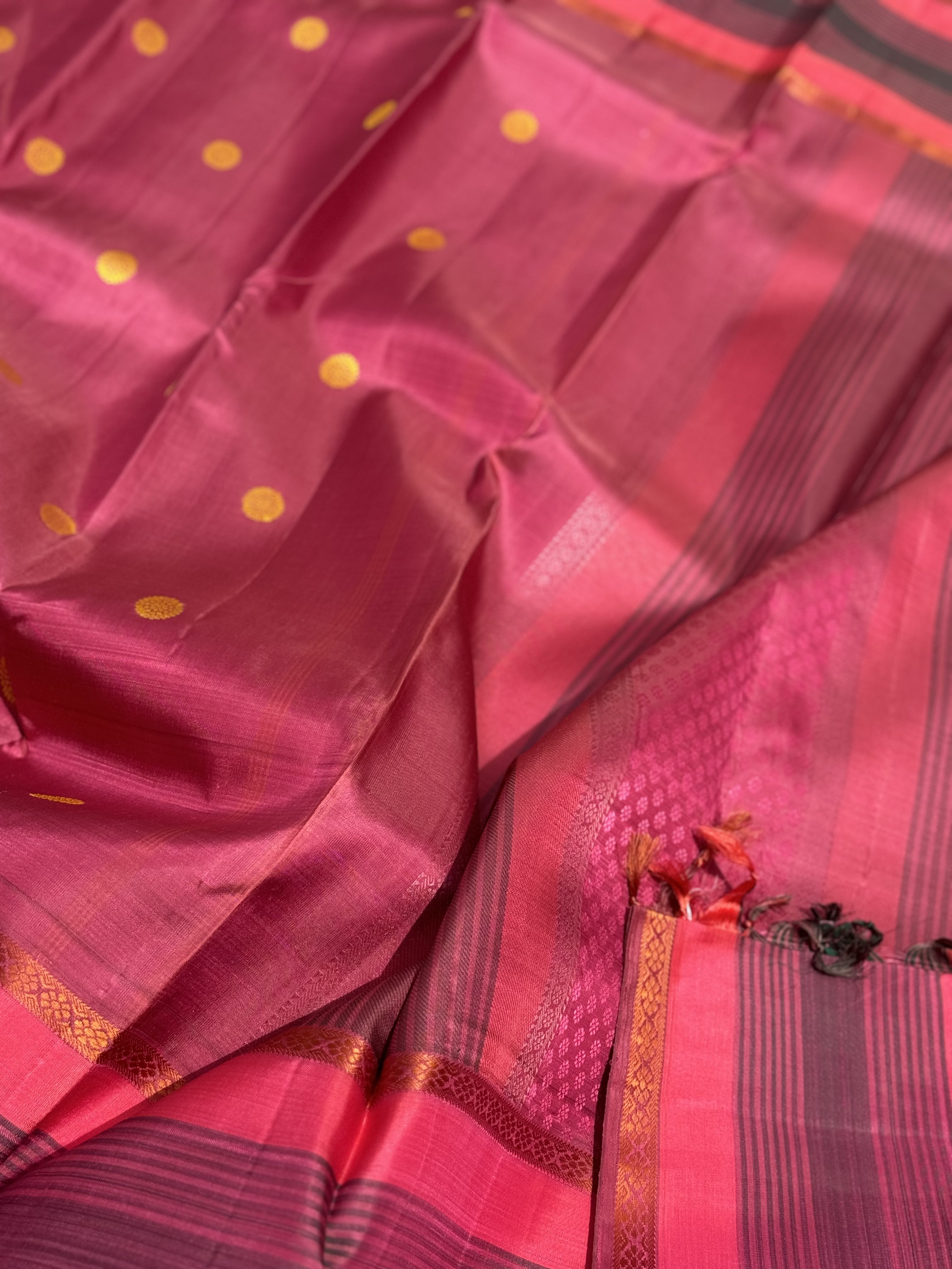 A Masterpiece no zari kanchivaram silk saree in a gorgeous mauve pink with yellow