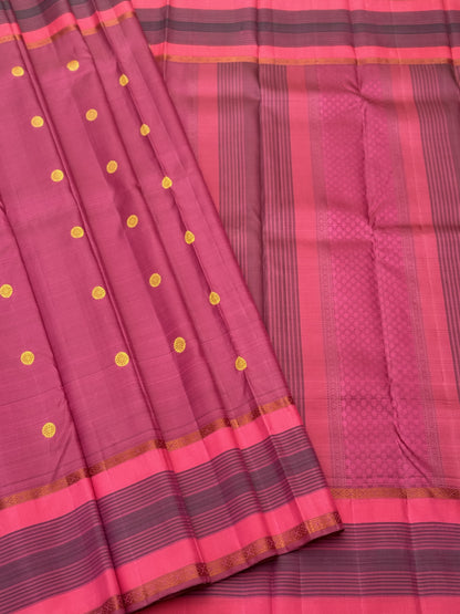 A Masterpiece no zari kanchivaram silk saree in a gorgeous mauve pink with yellow