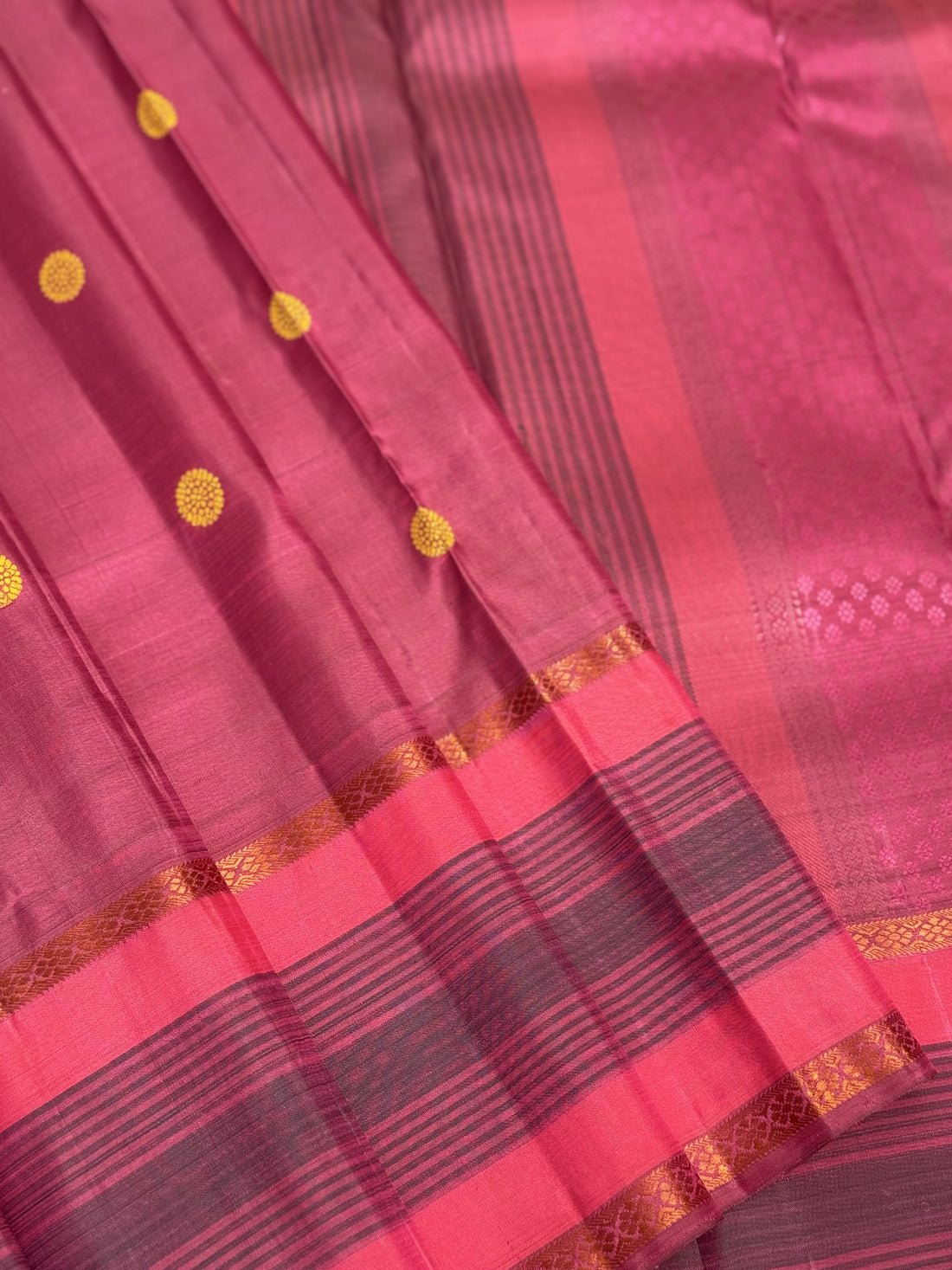 A Masterpiece no zari kanchivaram silk saree in a gorgeous mauve pink with yellow