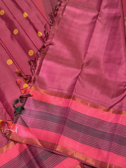 A Masterpiece no zari kanchivaram silk saree in a gorgeous mauve pink with yellow
