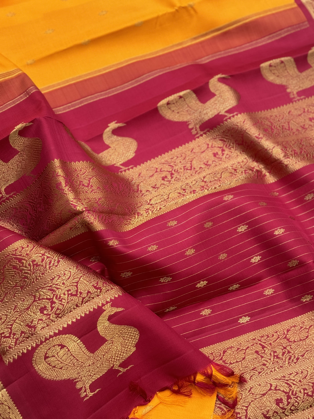 A stunner Masterpiece kanchivaram korvai silk saree in Mango yellow with arakku