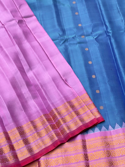 A gorgeous Peacock blue with pink Gadwal Silk saree