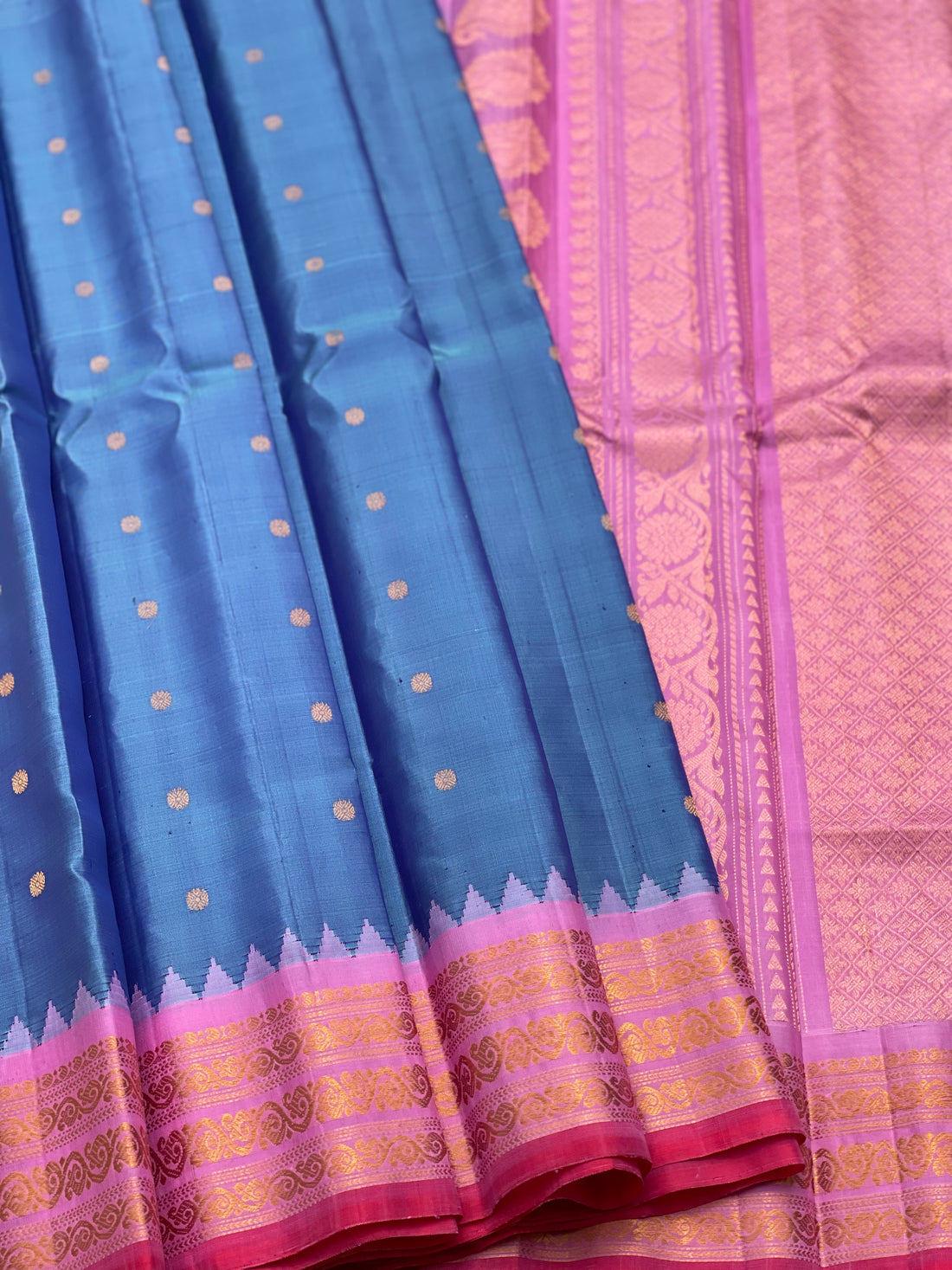 A gorgeous Peacock blue with pink Gadwal Silk saree