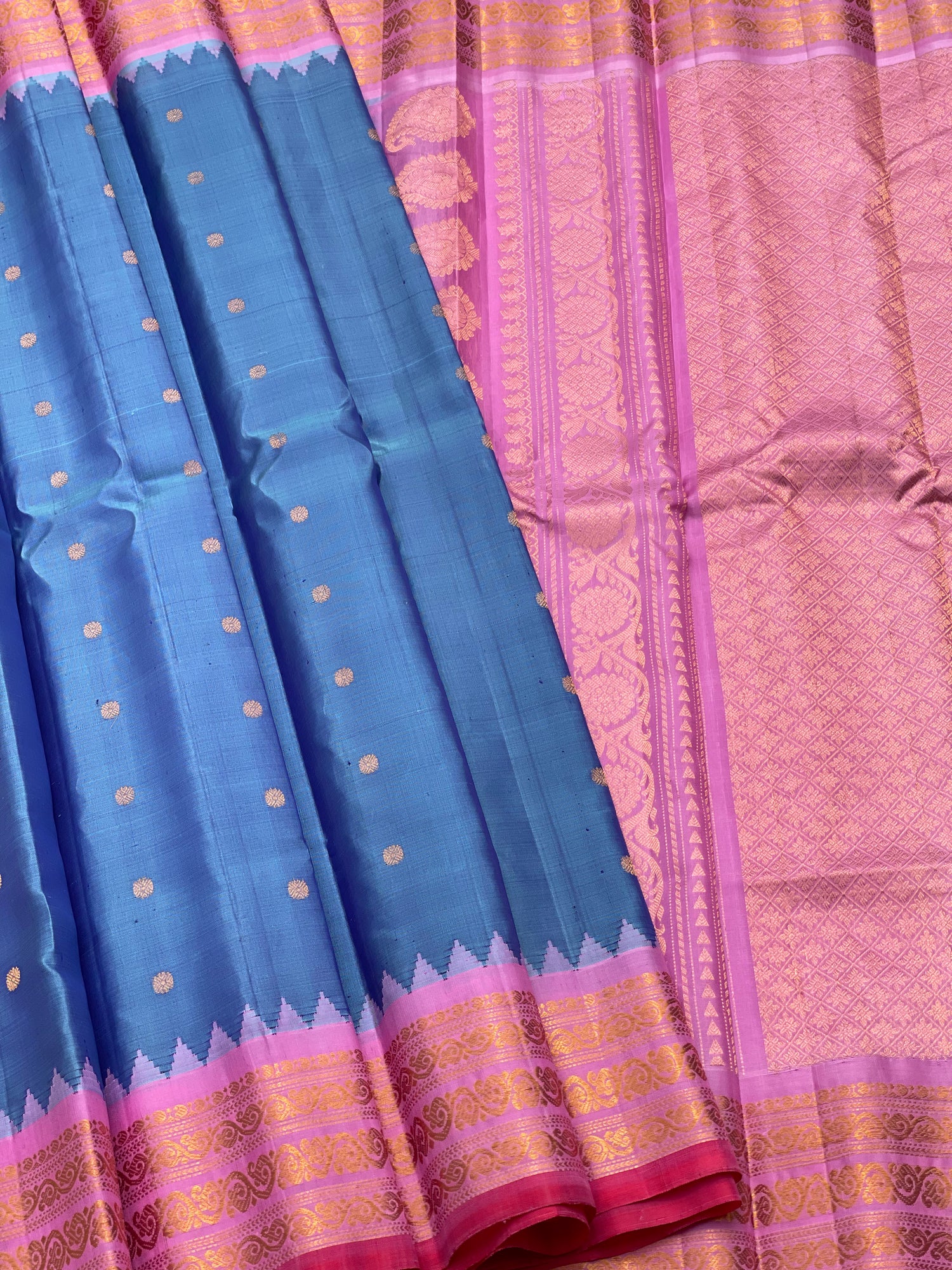 A gorgeous Peacock blue with pink Gadwal Silk saree