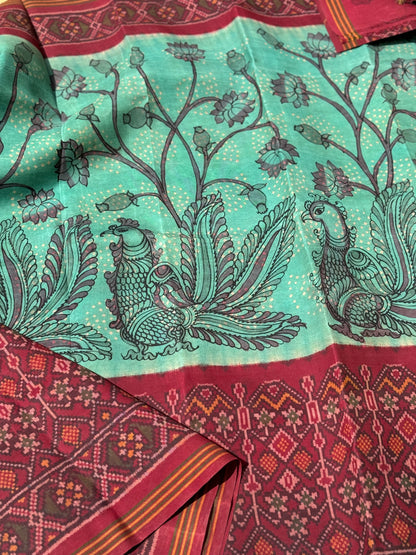 THARAGAI - Handknotted tie dyed Bhandej Ikkat silk saree with hand drawn and handpainted Penkanamkari Saree