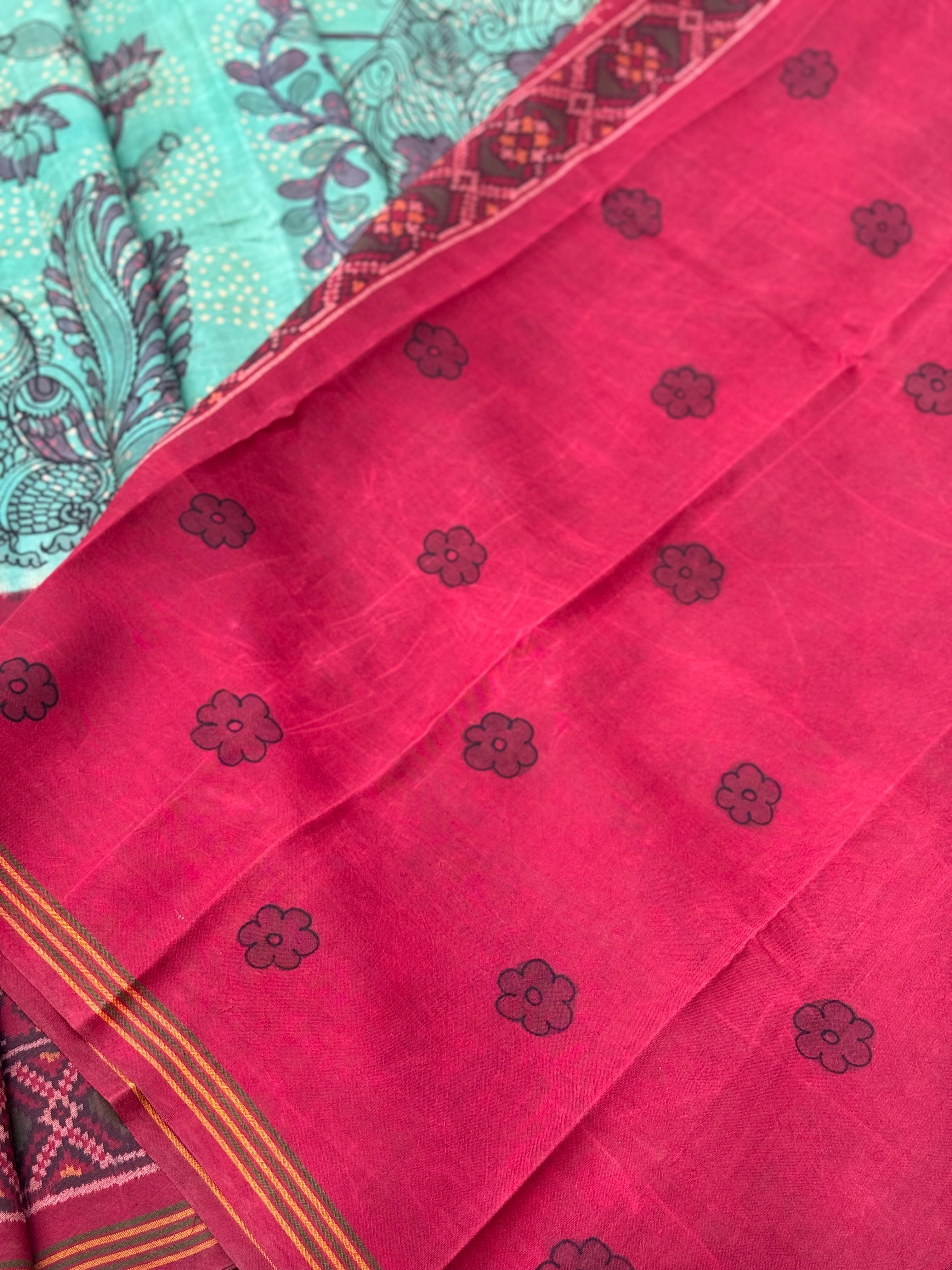 THARAGAI - Handknotted tie dyed Bhandej Ikkat silk saree with hand drawn and handpainted Penkanamkari Saree