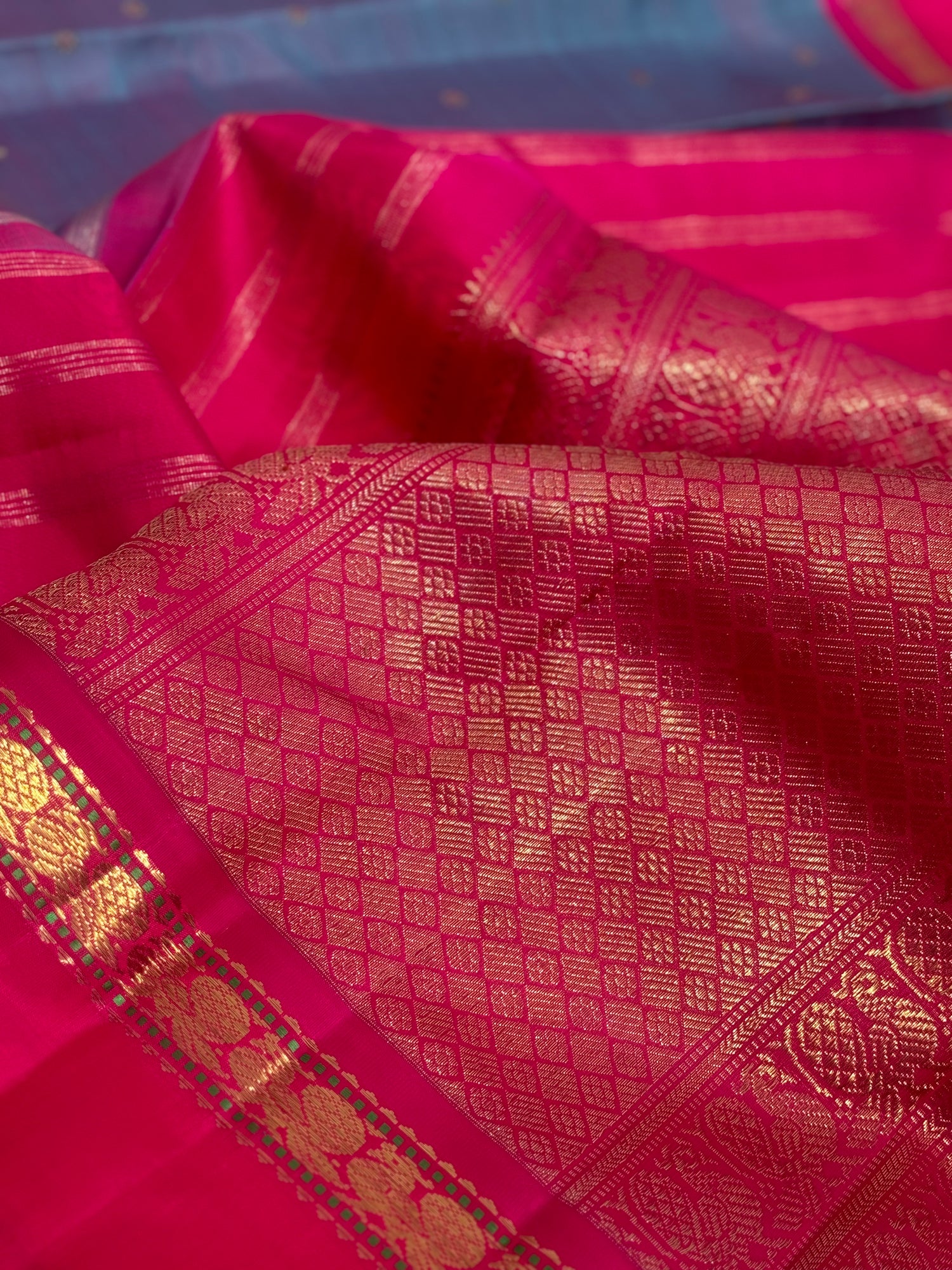 A Masterpiece kanchivaram korvai silk saree in peacock blue with pink