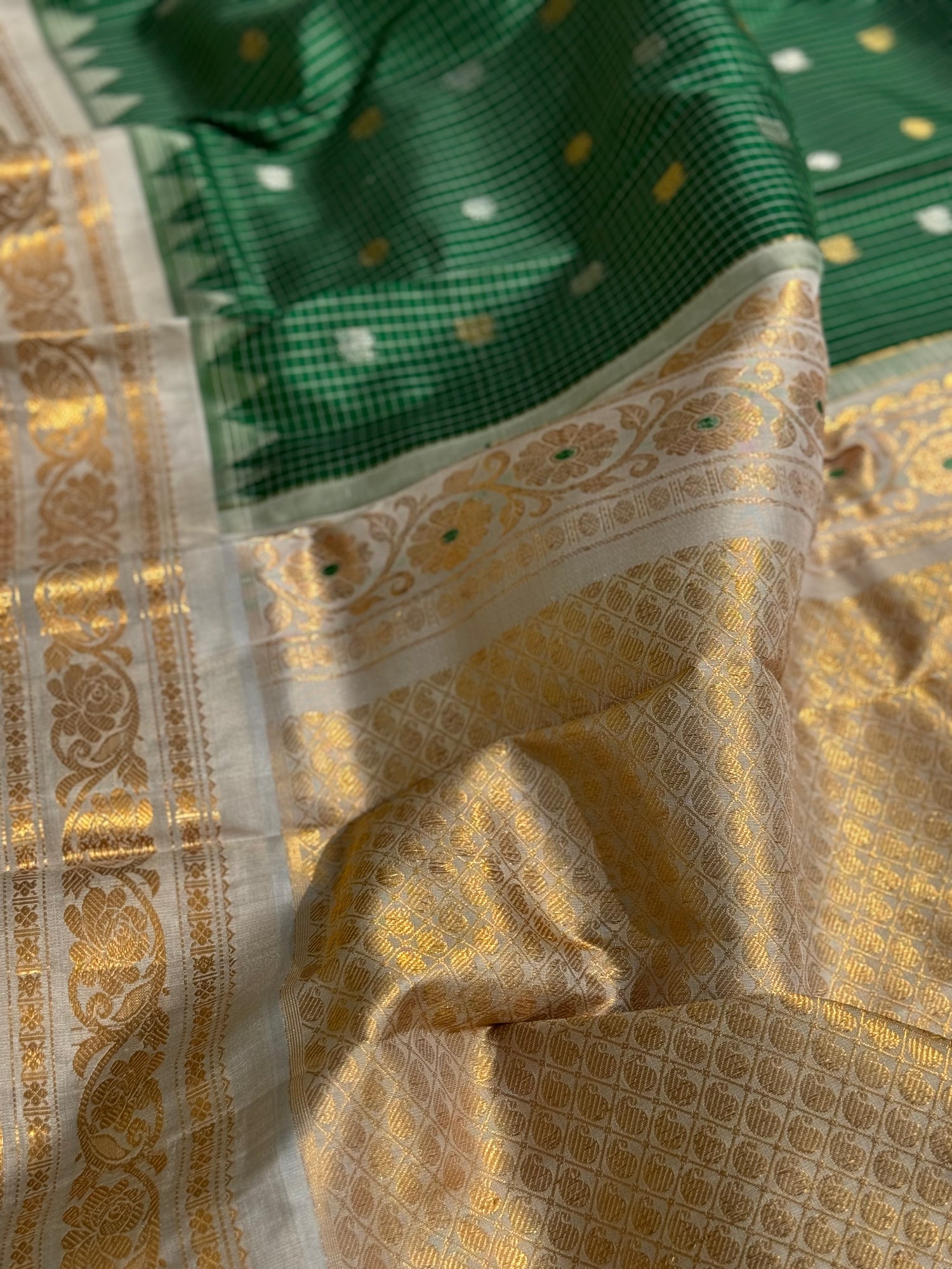 An Elegant Bottlegreen Gadwal silk with Meenakari work Kanchi border