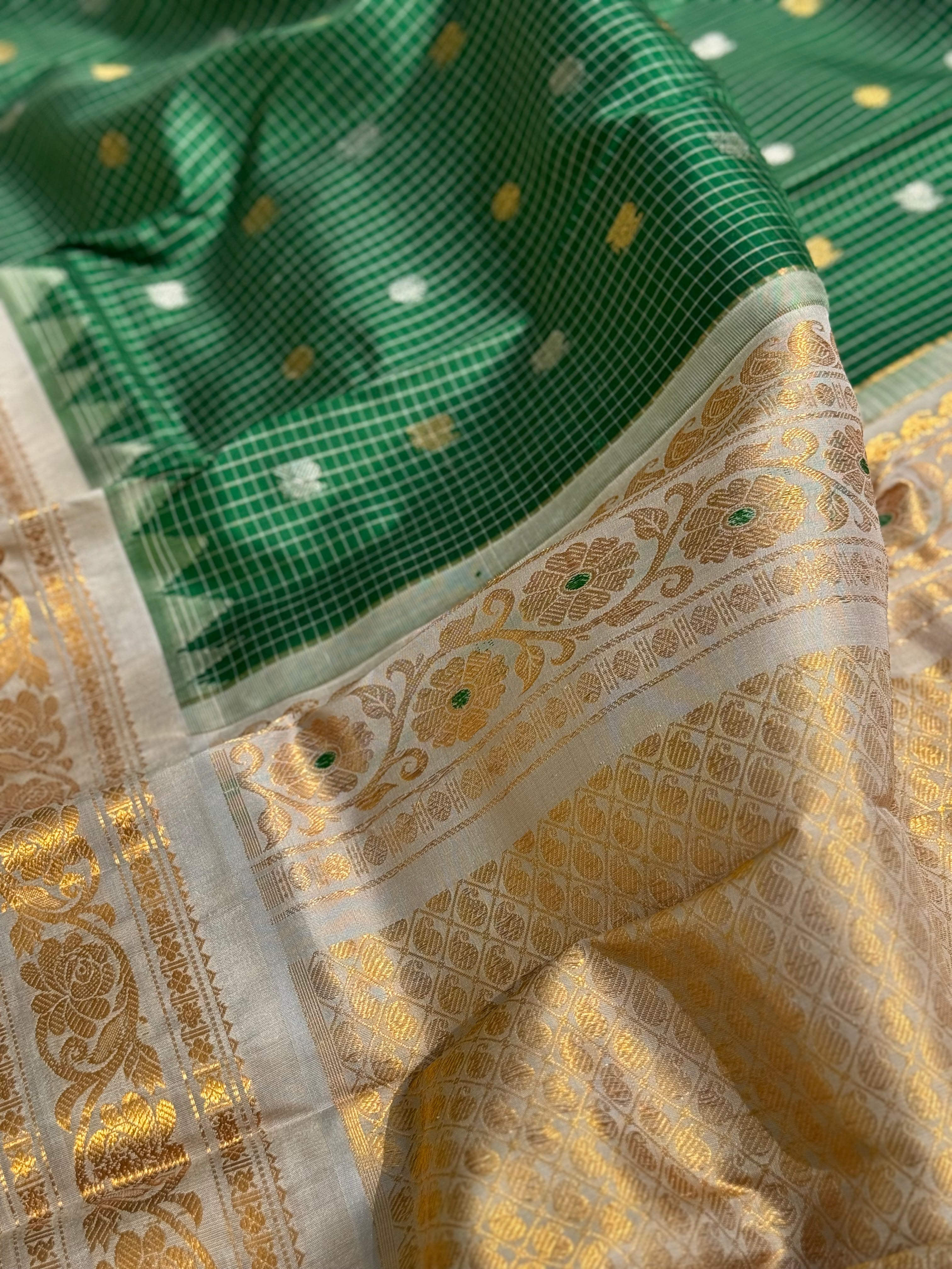 An Elegant Bottlegreen Gadwal silk with Meenakari work Kanchi border