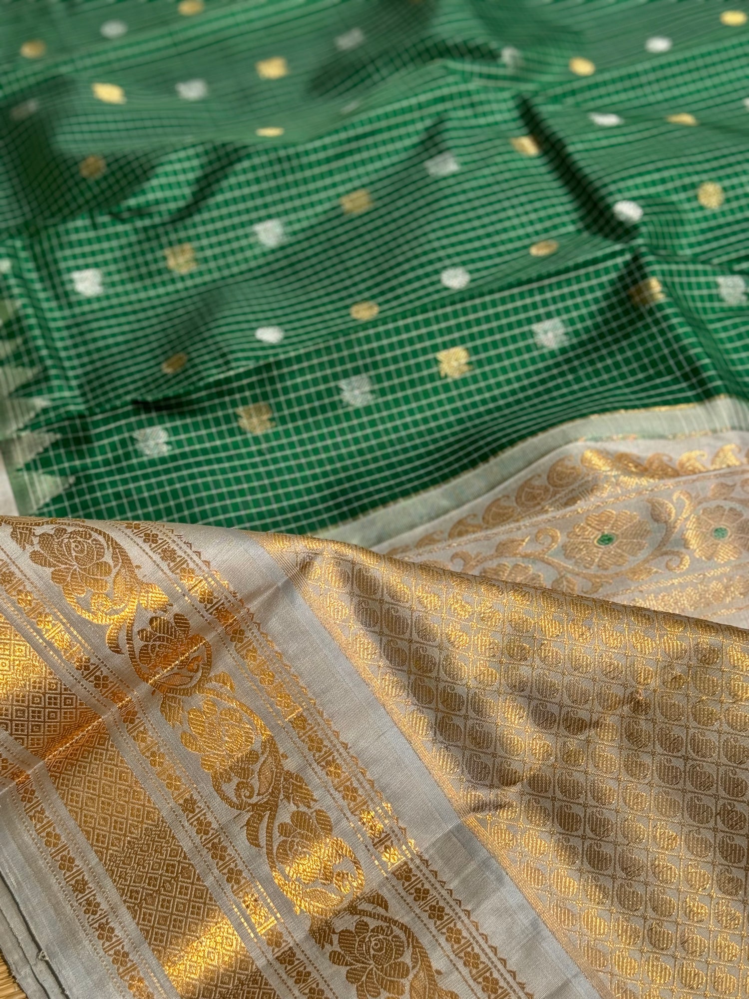 An Elegant Bottlegreen Gadwal silk with Meenakari work Kanchi border