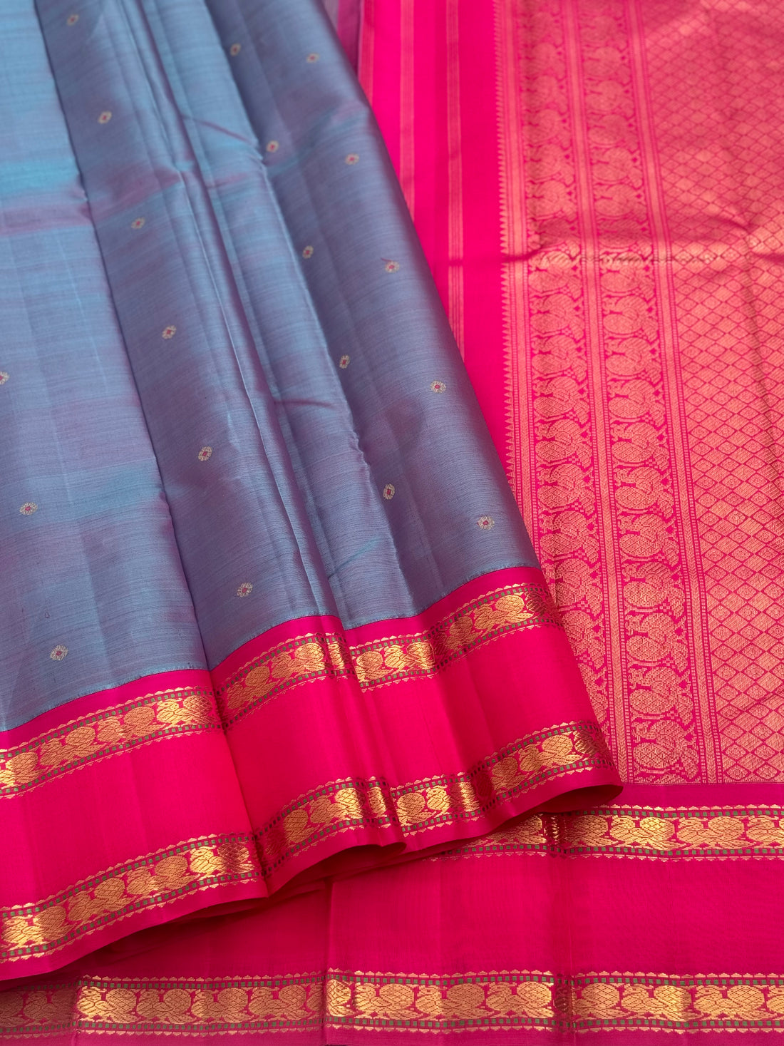 A Masterpiece kanchivaram korvai silk saree in peacock blue with pink