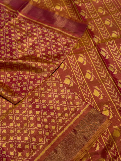 A gorgeous shot peach with pink single ikkat patola silk saree