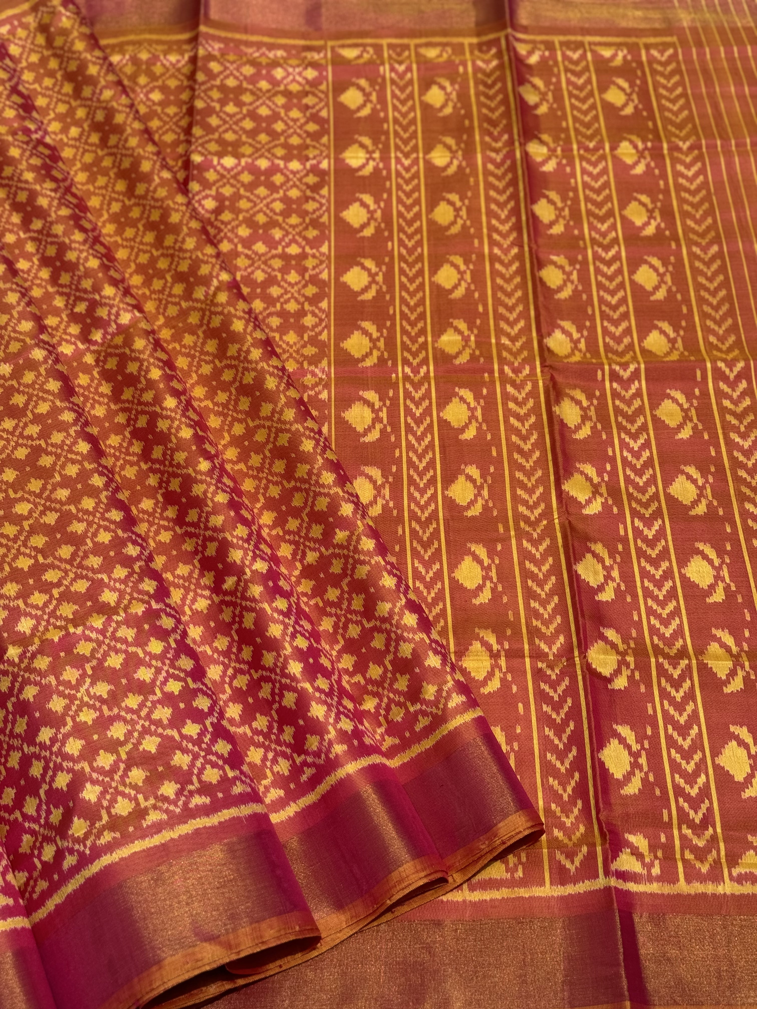 A gorgeous shot peach with pink single ikkat patola silk saree