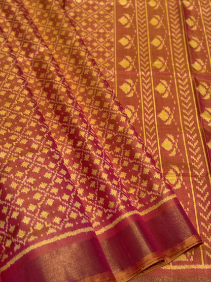 A gorgeous shot peach with pink single ikkat patola silk saree