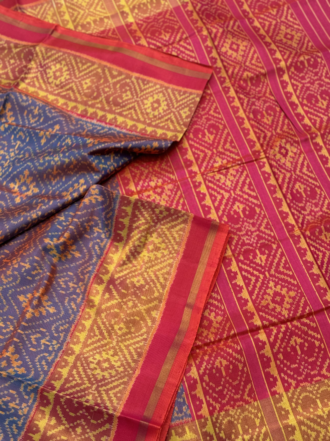 A gorgeous shot blue with pink single ikkat patola silk saree