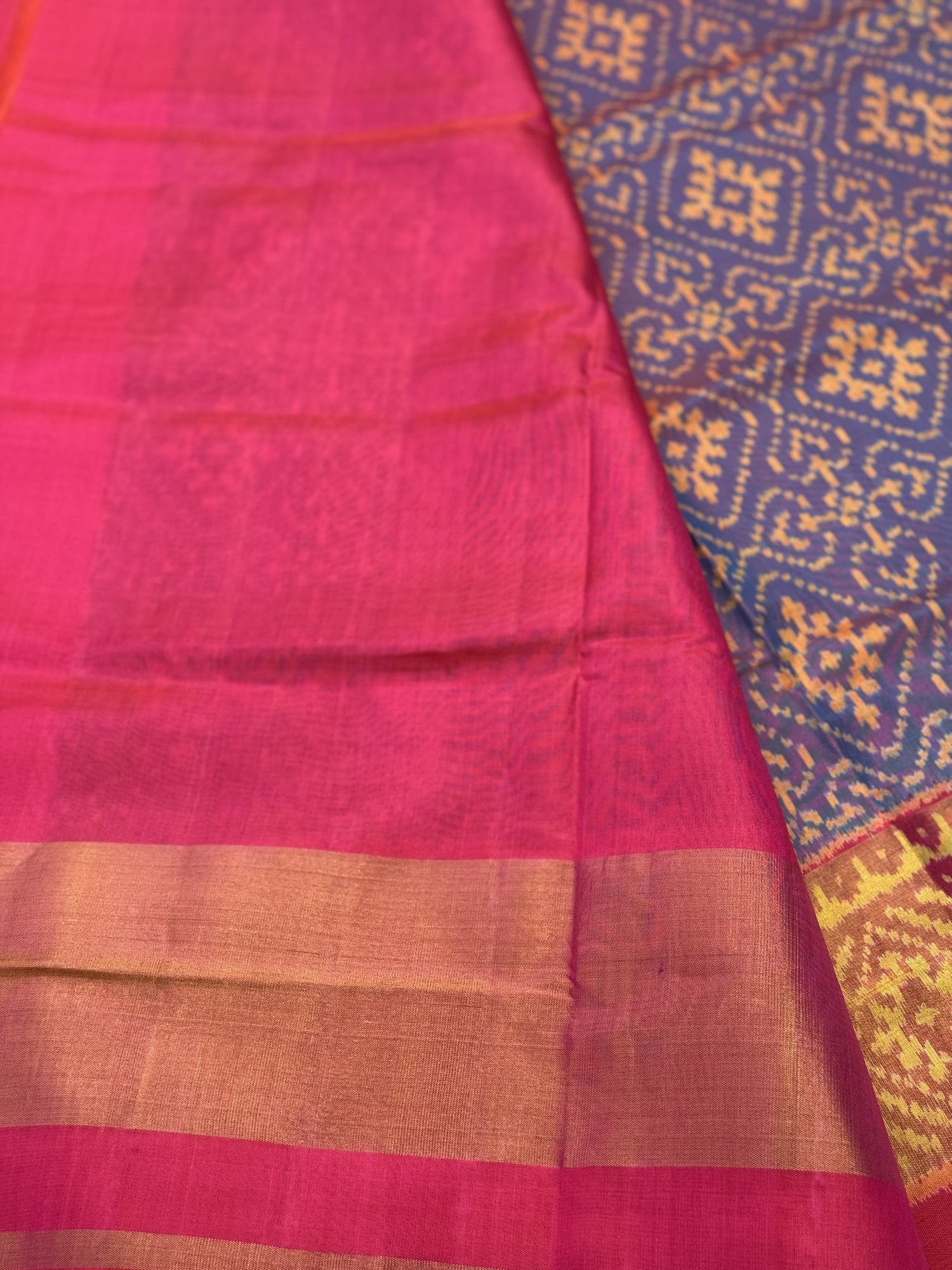 A gorgeous shot blue with pink single ikkat patola silk saree