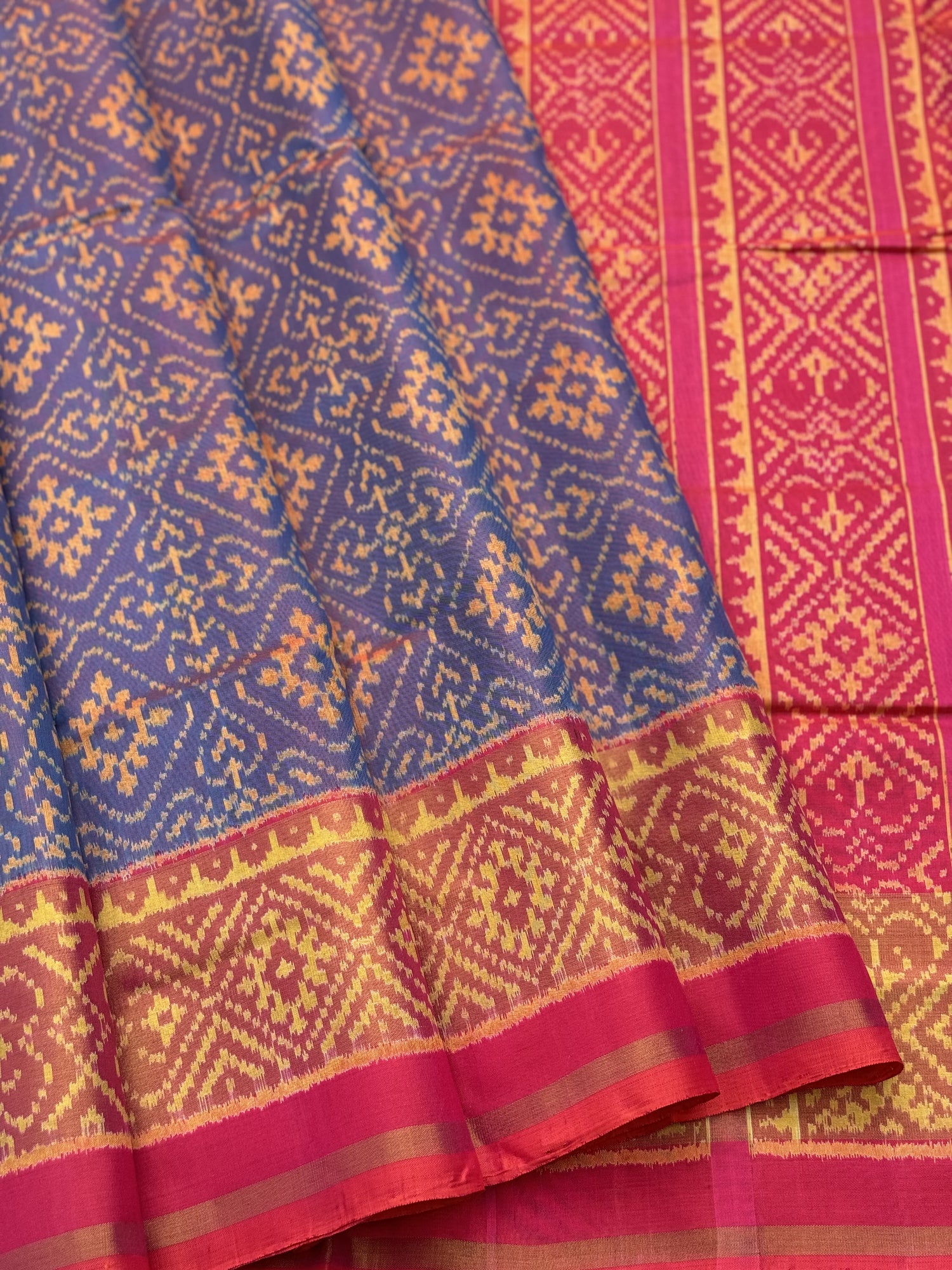 A gorgeous shot blue with pink single ikkat patola silk saree