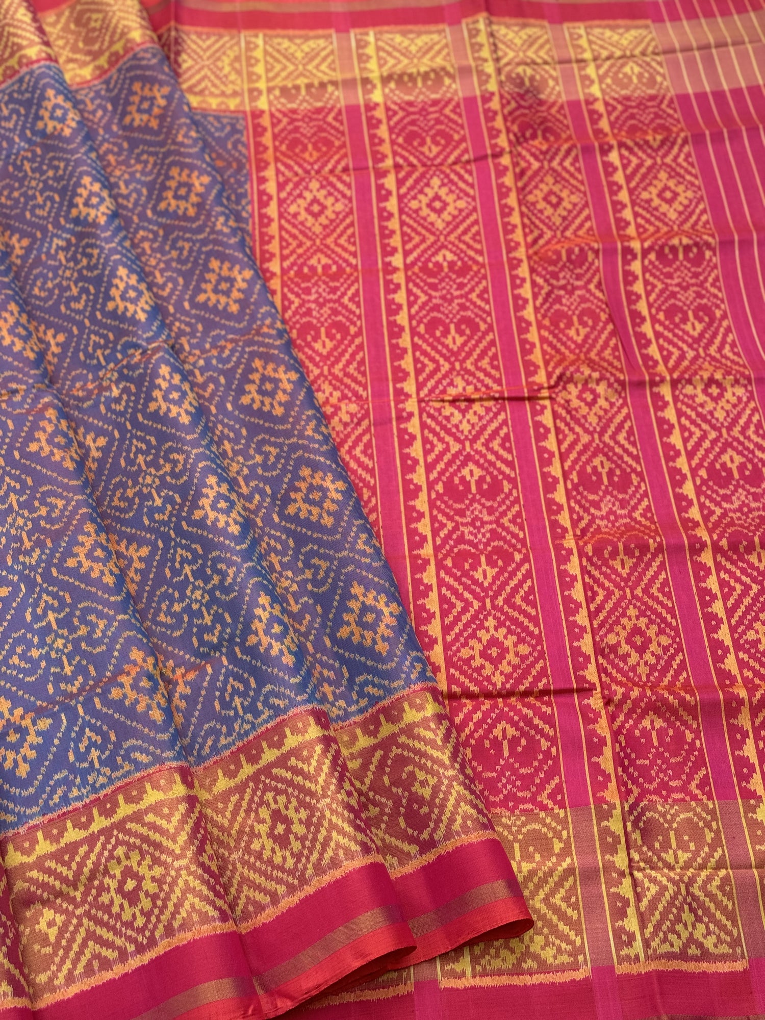 A gorgeous shot blue with pink single ikkat patola silk saree