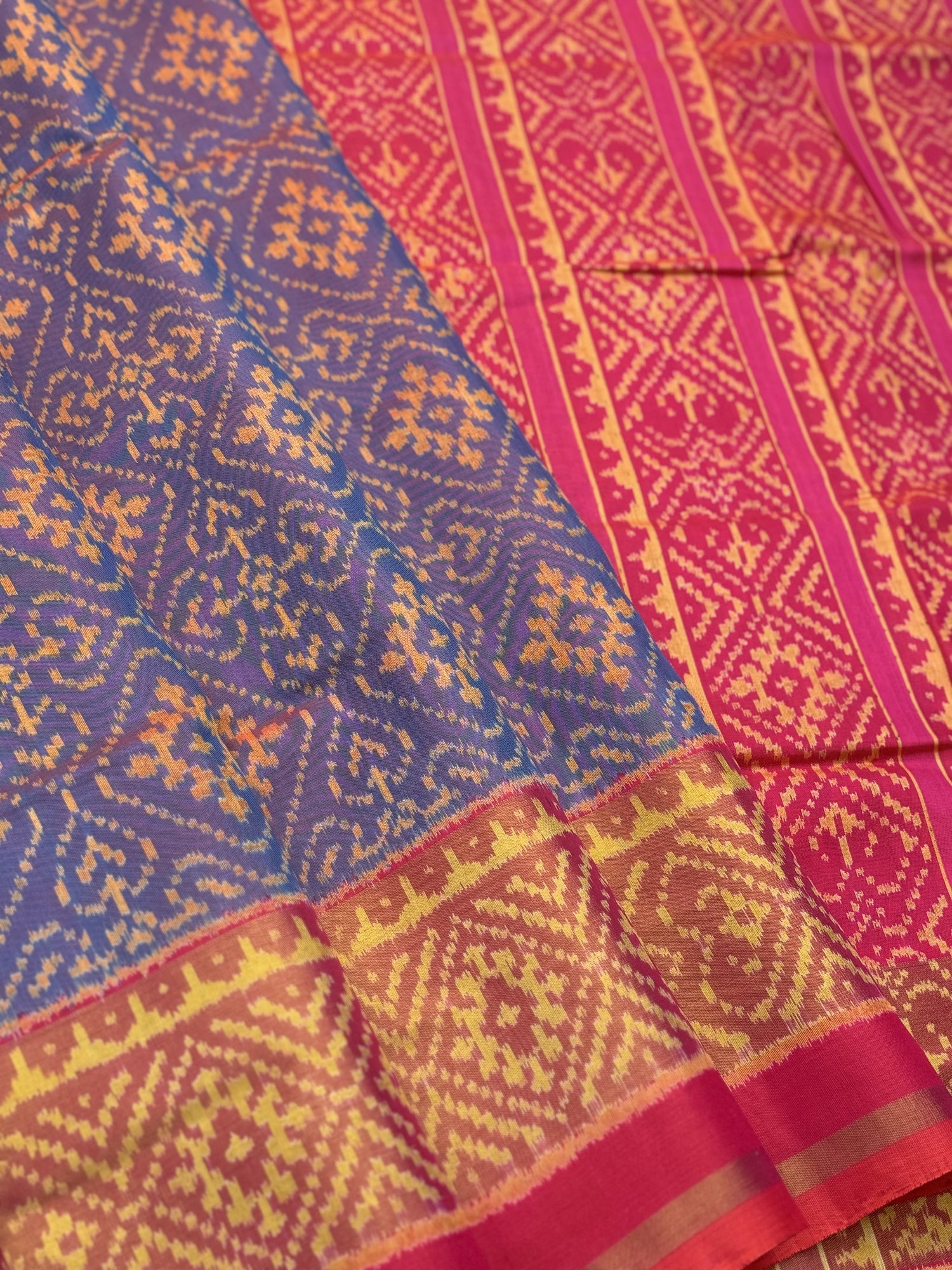 A gorgeous shot blue with pink single ikkat patola silk saree