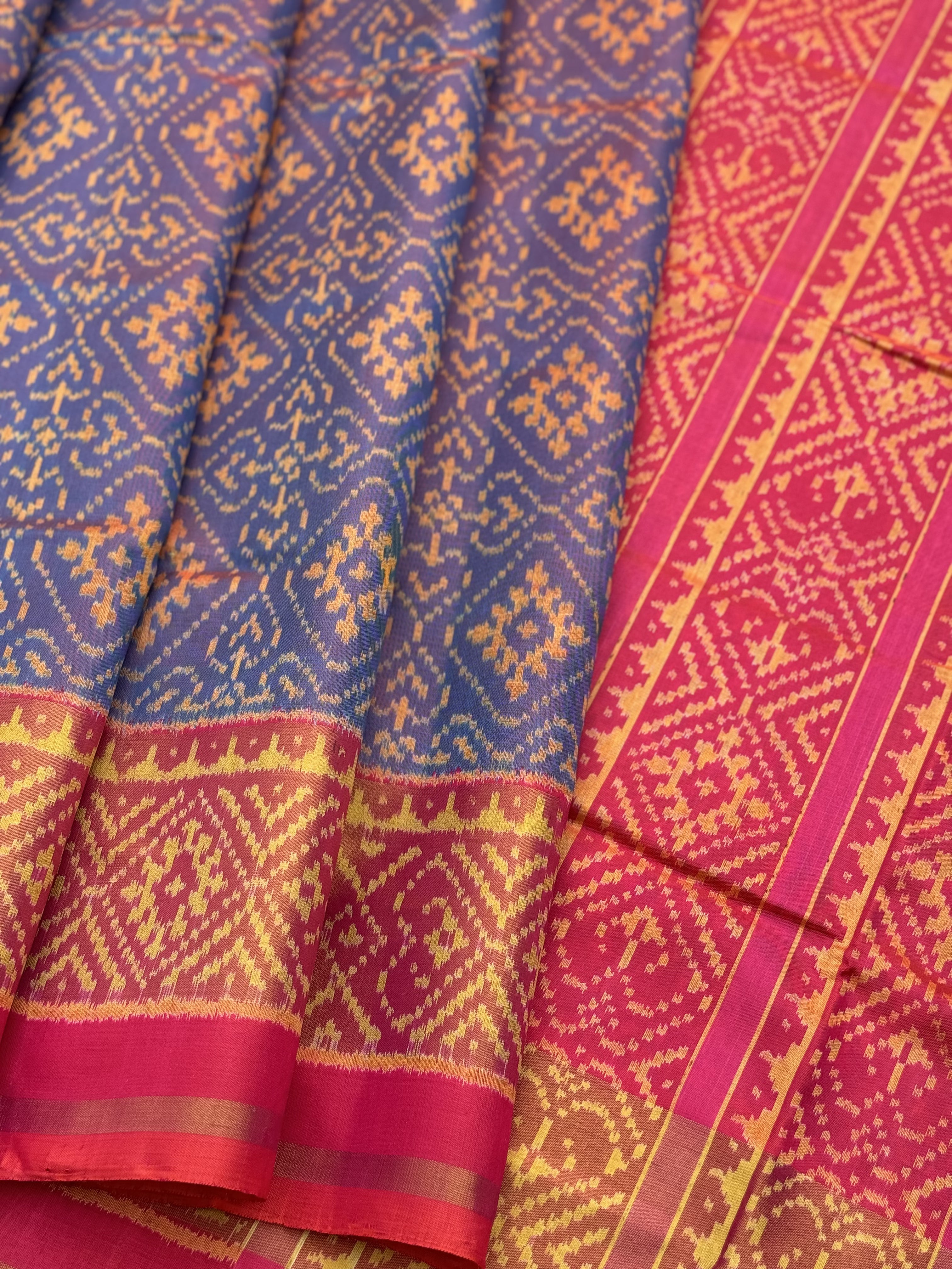 A gorgeous shot blue with pink single ikkat patola silk saree