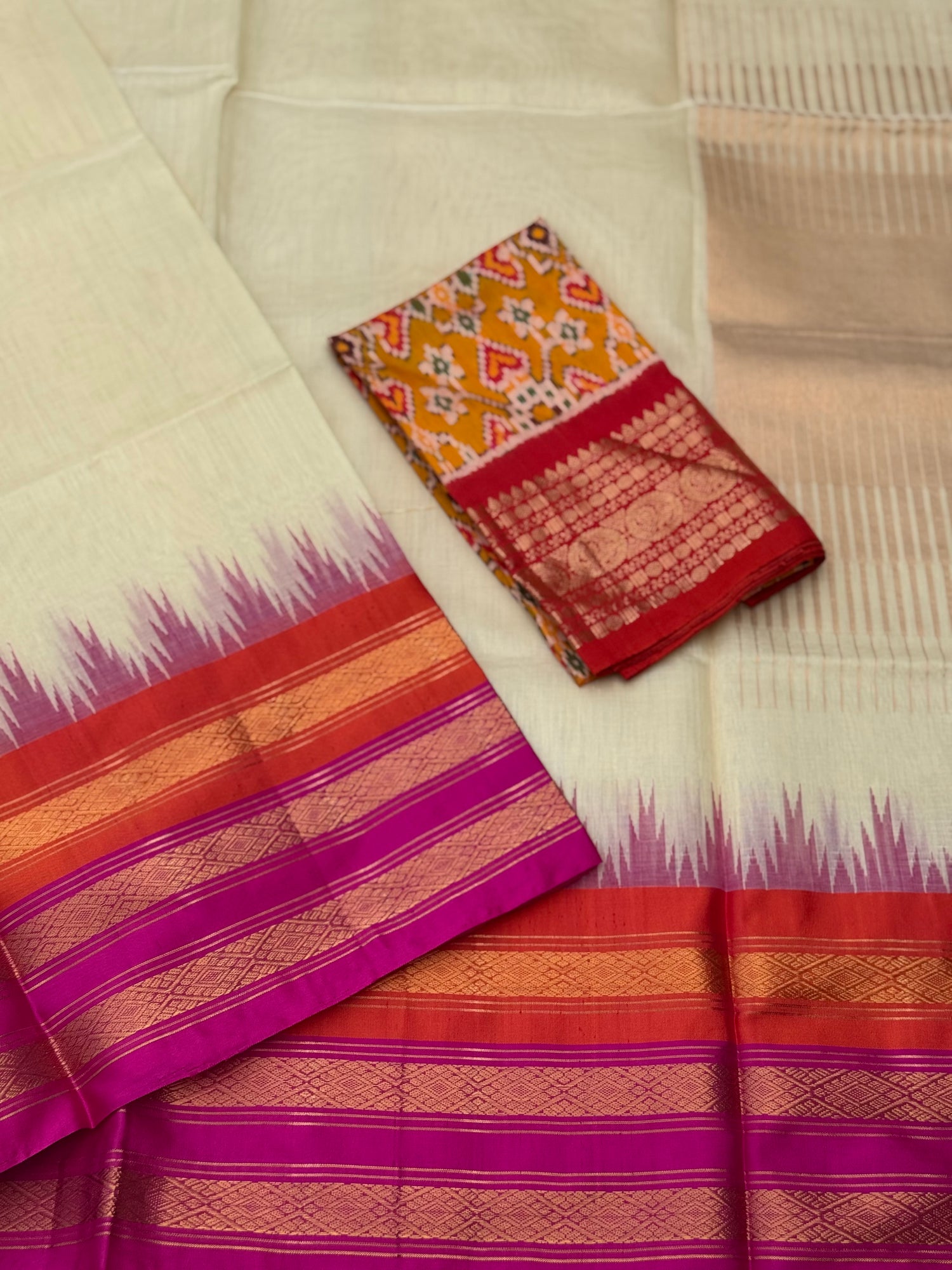 Handspun and handwoven ponduru Khadhi silk saree with silk border in contrast orange pink