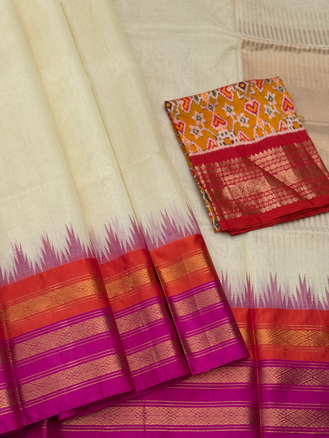 Handspun and handwoven ponduru Khadhi silk saree with silk border in contrast orange pink