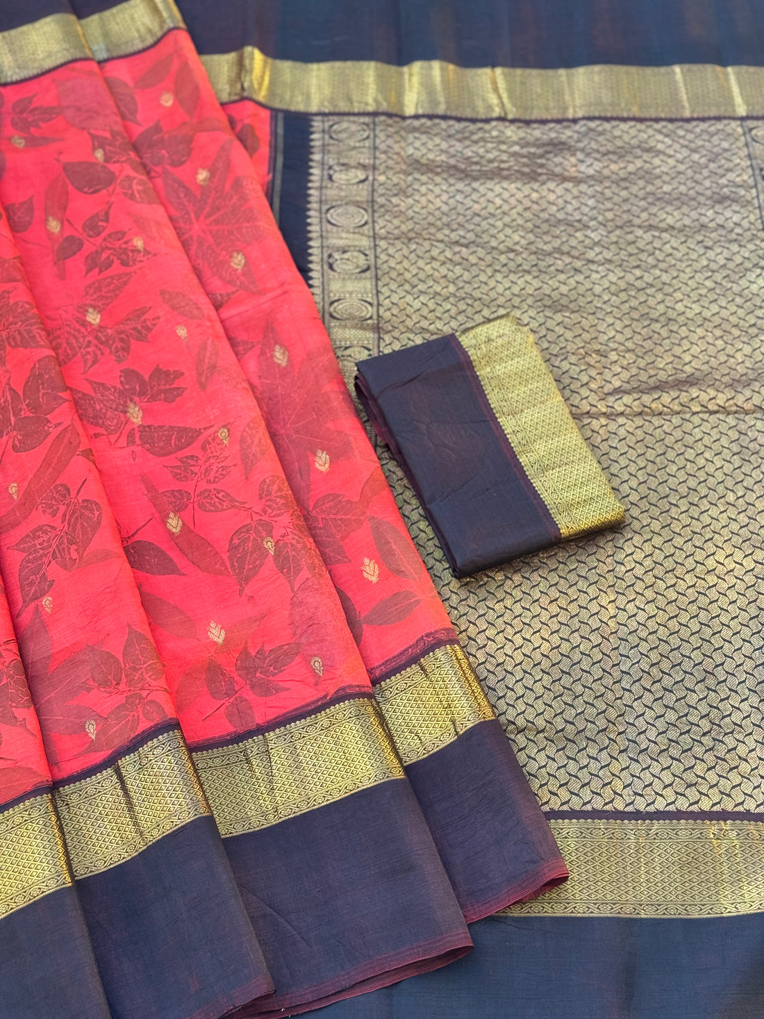 A stunningly gorgeous tomato red korvai kanchivaram silk saree with Ecoprints