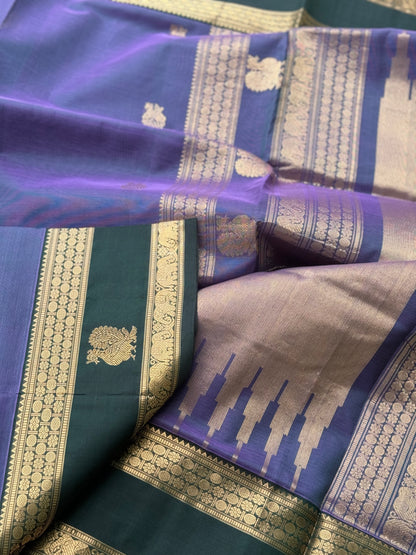A gorgeous lavender with bottlegreen handwoven horsemotifs  Kanchi silk cotton saree