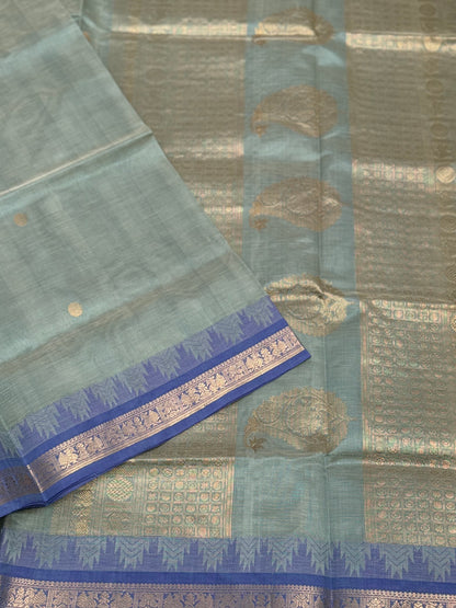 Kanchi silk cotton saree in sage green with blue shade zari woven