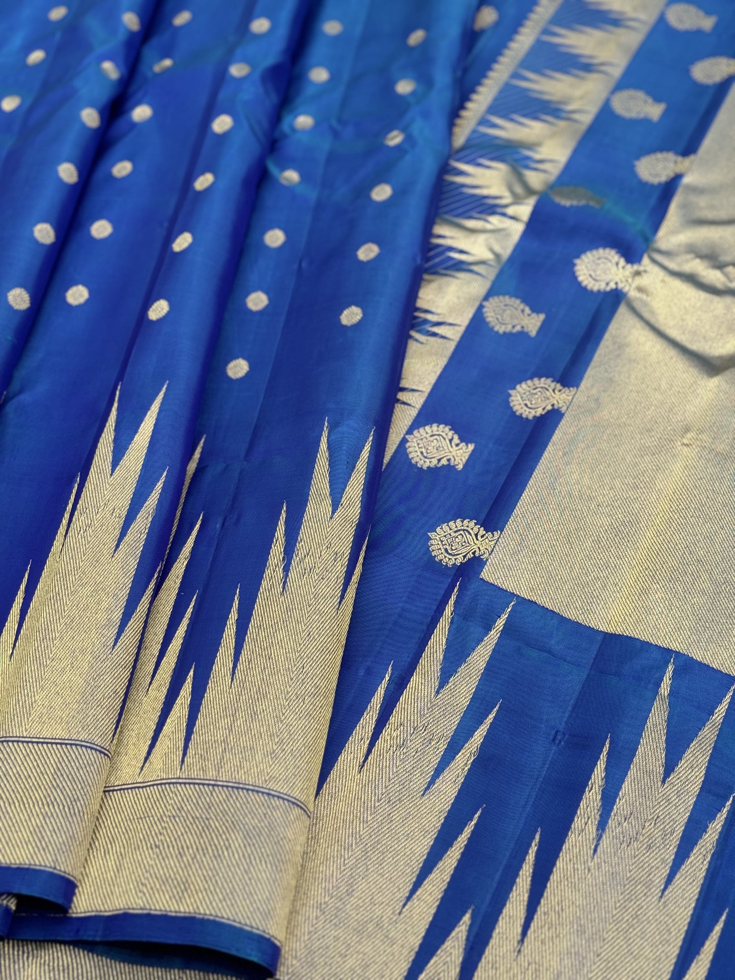 APURVA - Handwoven A gorgeous antique gold with zari woven peacock blue gadwal saree