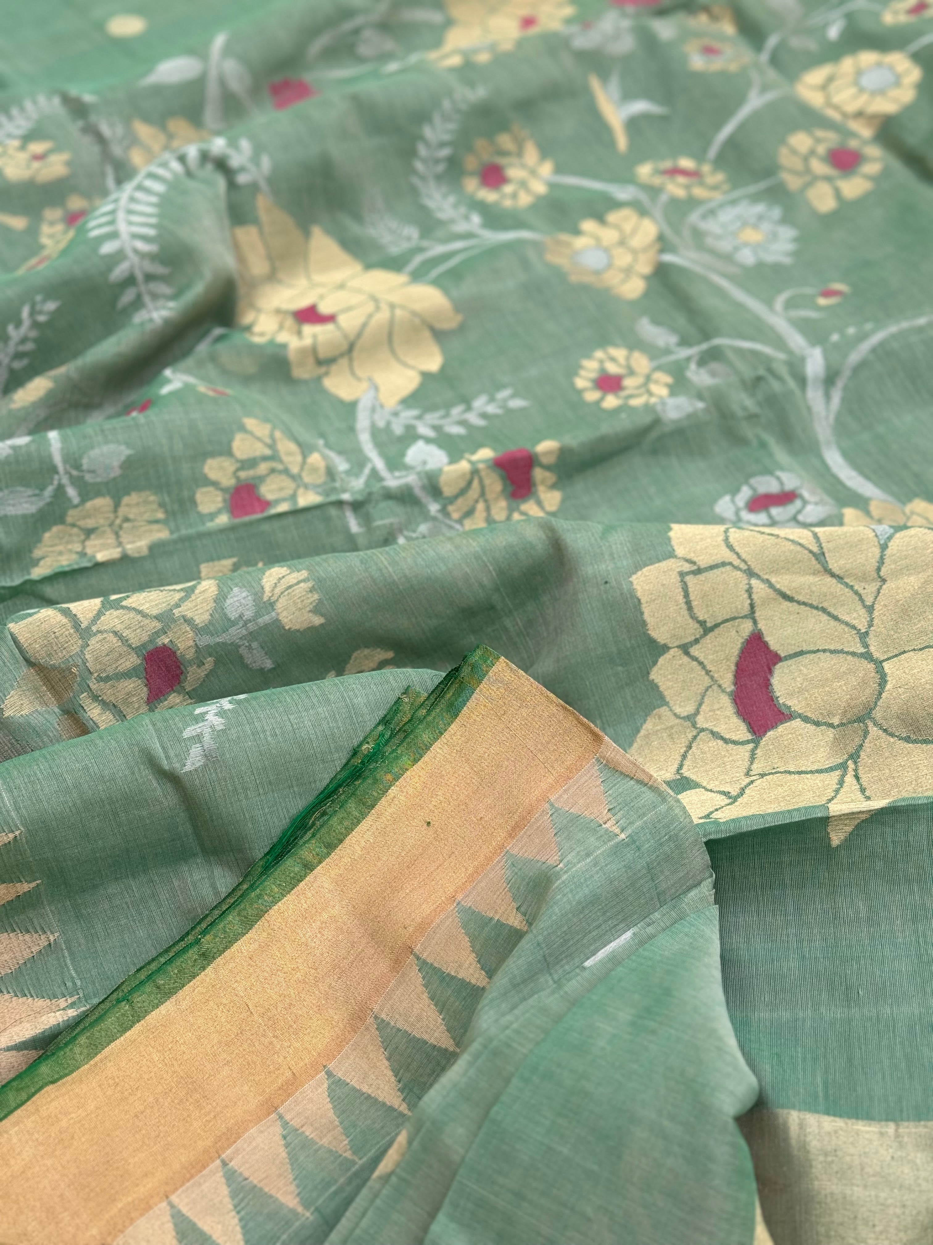 A gorgeous handspun ponduru Khadhi jamdani cotton saree in pastel green