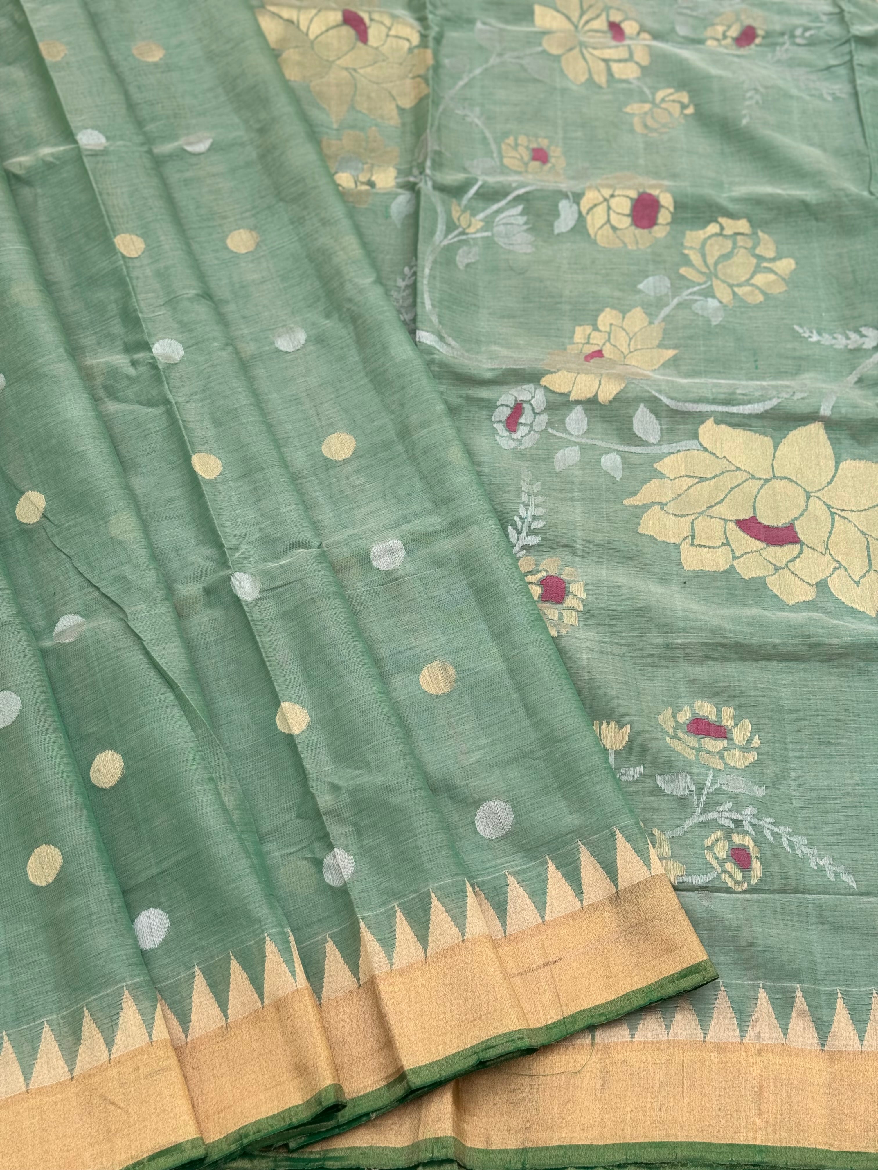 A gorgeous handspun ponduru Khadhi jamdani cotton saree in pastel green