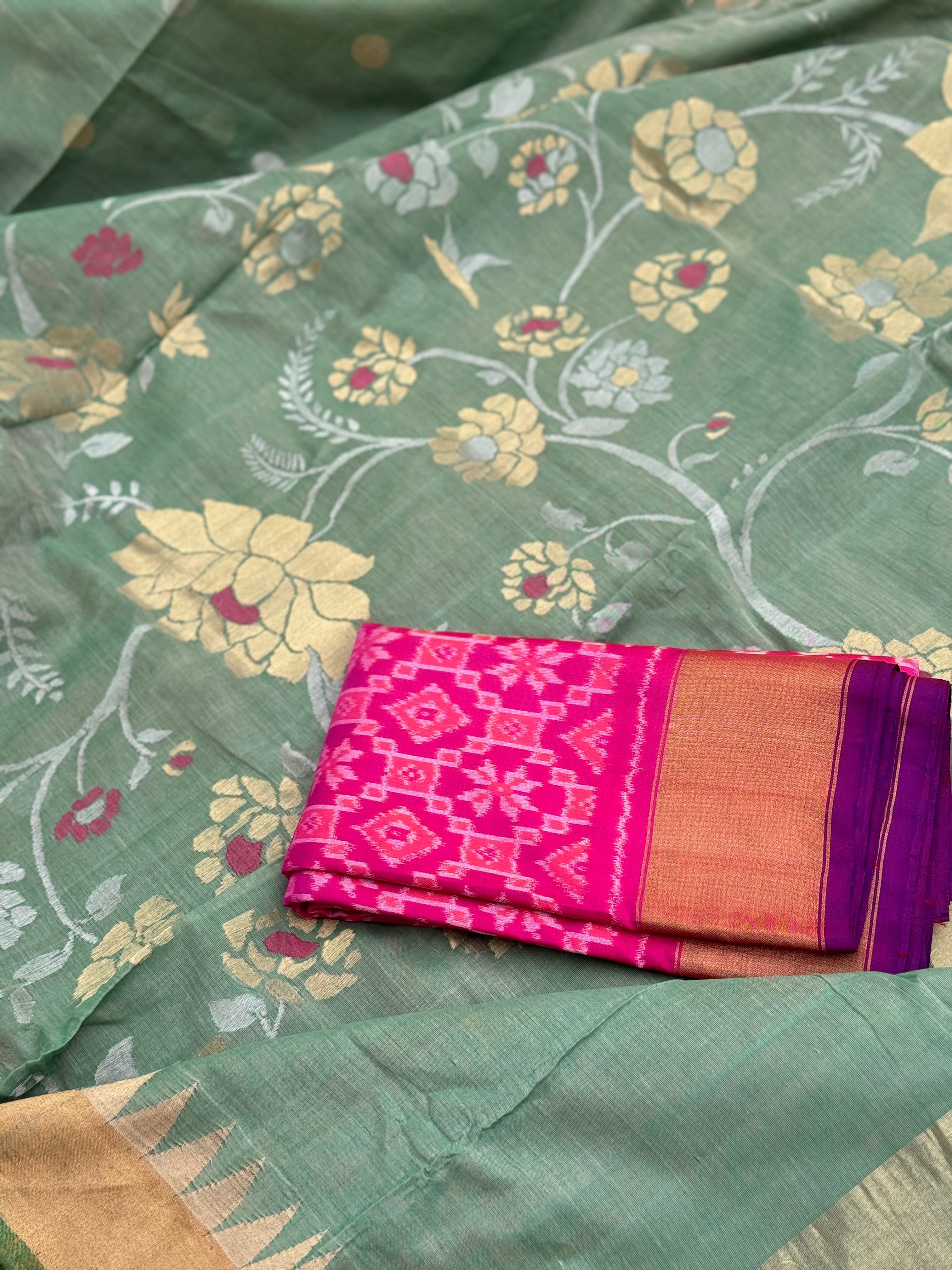 A gorgeous handspun ponduru Khadhi jamdani cotton saree in pastel green