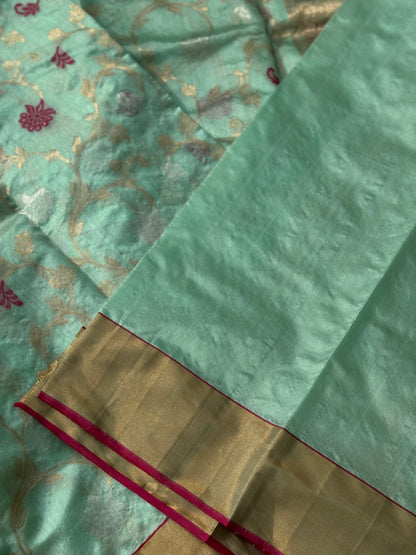 A foam green handwoven chanderi silk saree with full jaal weave ek naal and meenakari