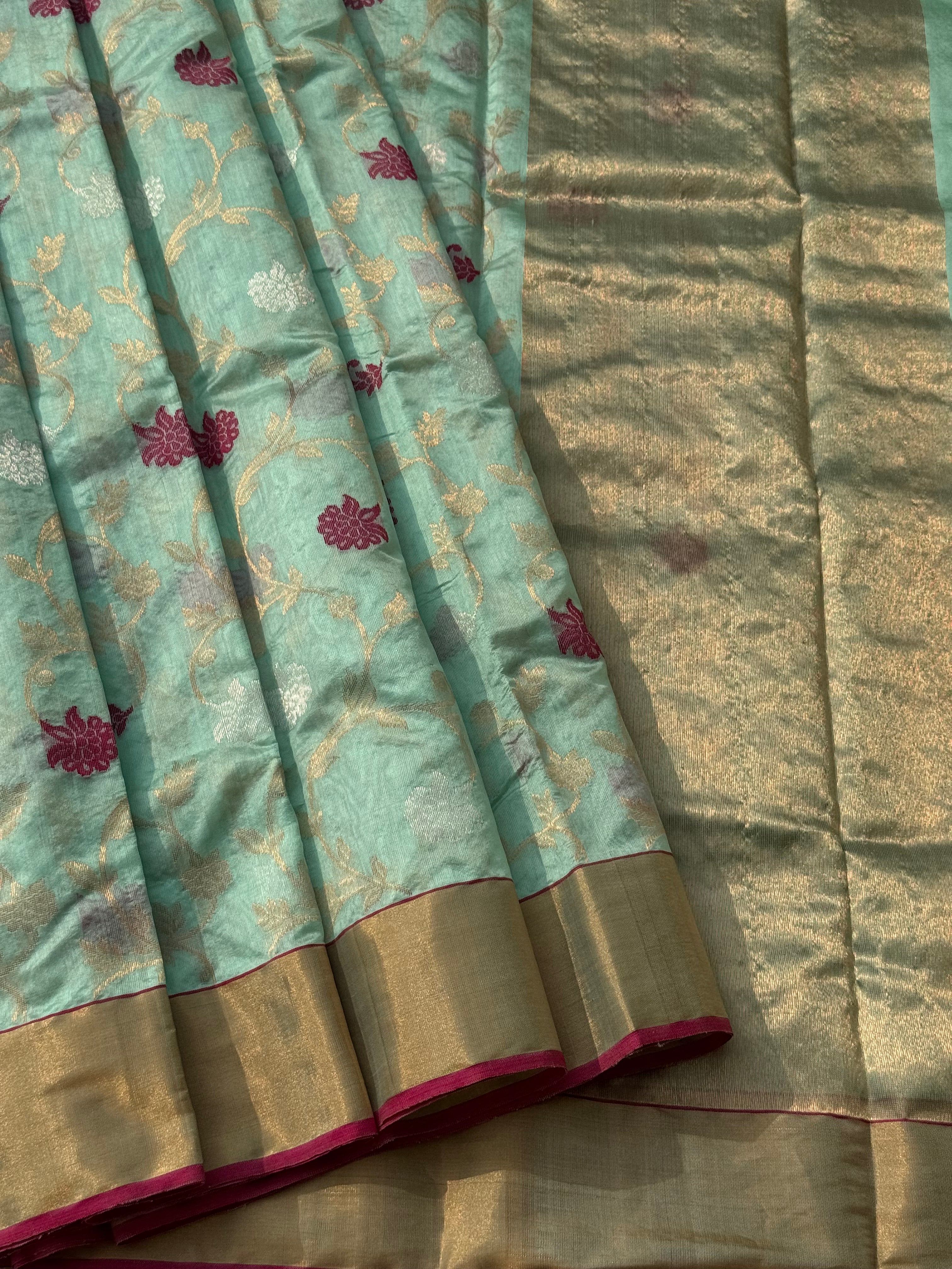 A foam green handwoven chanderi silk saree with full jaal weave ek naal and meenakari