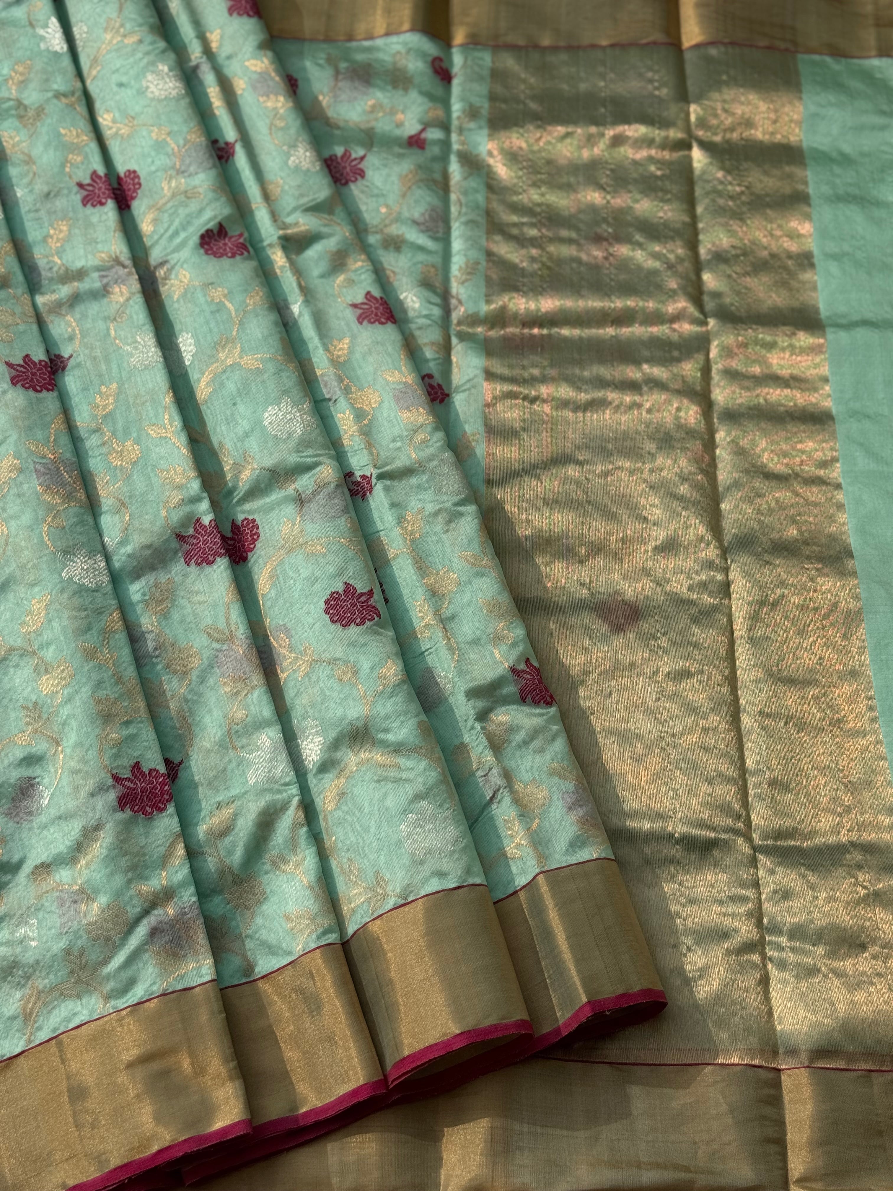 A foam green handwoven chanderi silk saree with full jaal weave ek naal and meenakari