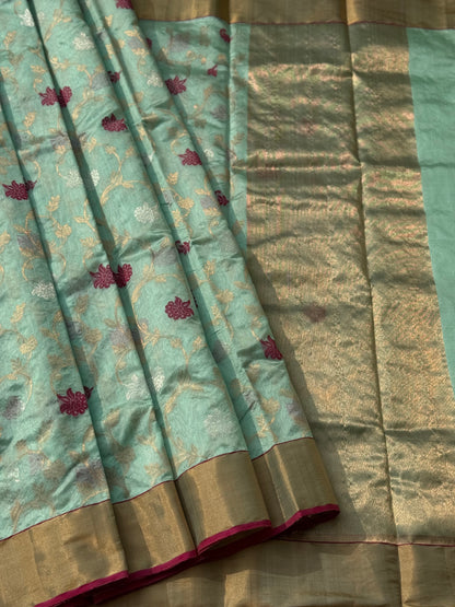 A foam green handwoven chanderi silk saree with full jaal weave ek naal and meenakari