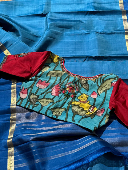 The classy peacock blue with red white silk penkalamkari blouse