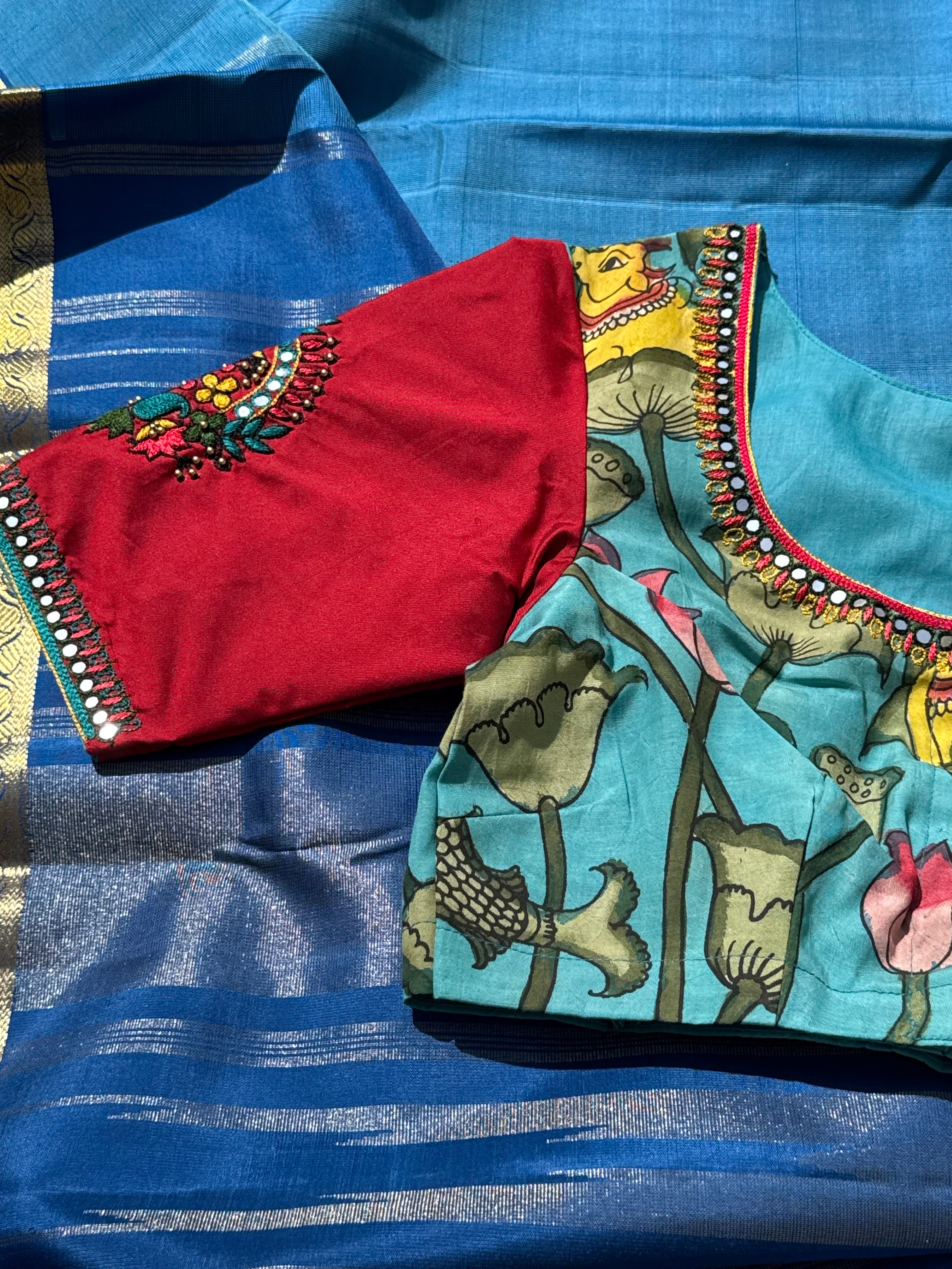 The classy peacock blue with red white silk penkalamkari blouse