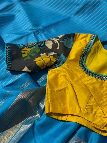 RAVIKKAI- The timeless classy ensemble vivid blue with yellow silk penkalamkari