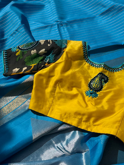 RAVIKKAI- The timeless classy ensemble vivid blue with yellow silk penkalamkari