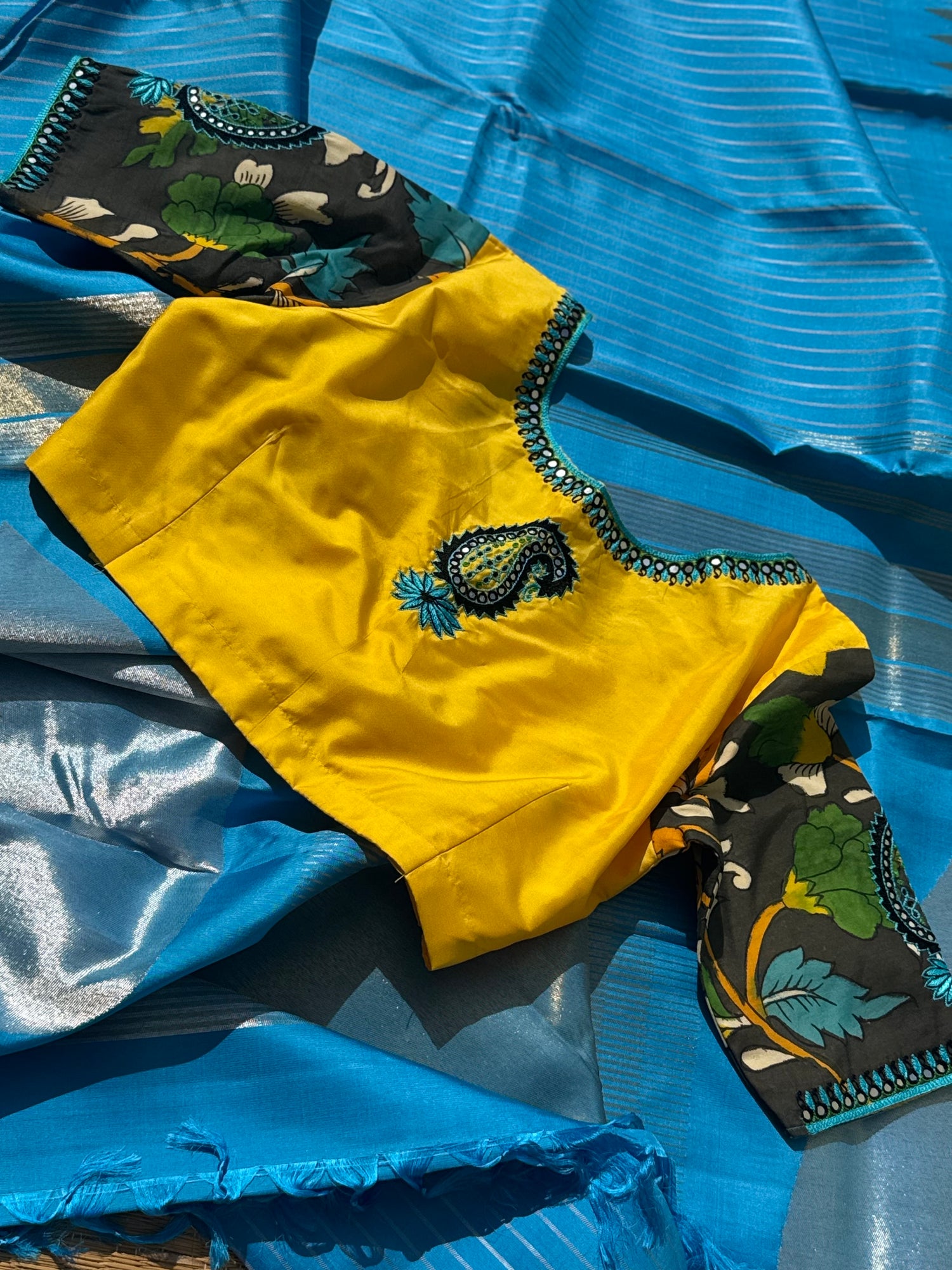 RAVIKKAI- The timeless classy ensemble vivid blue with yellow silk penkalamkari