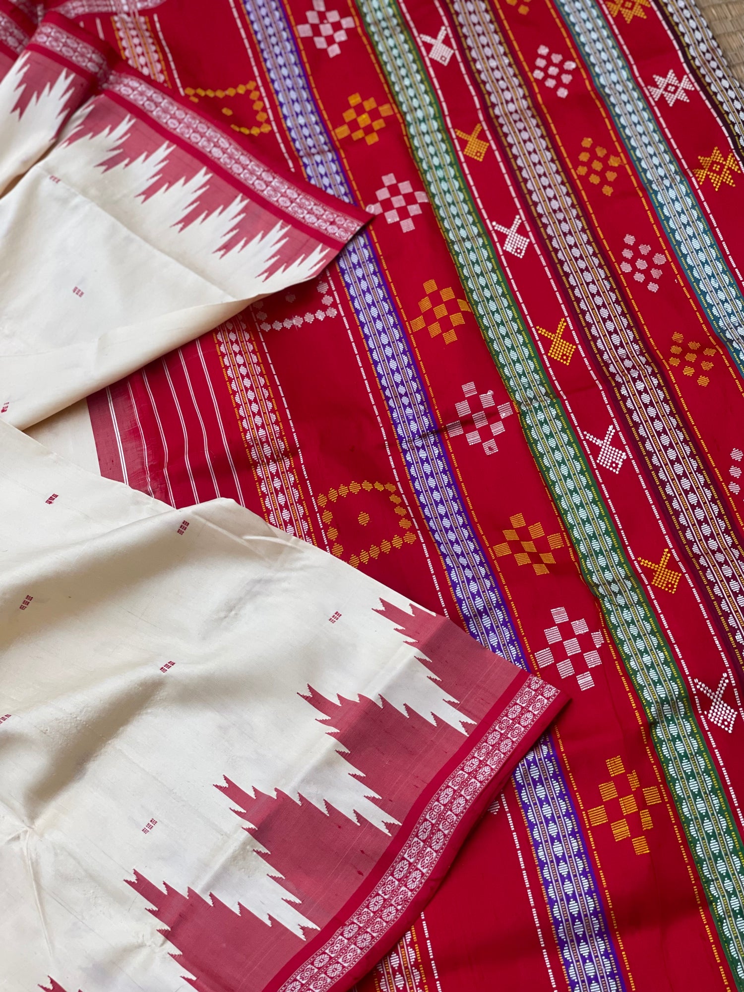 An elegant Berhampuri patta Silk saree from Odisha in Pearl white