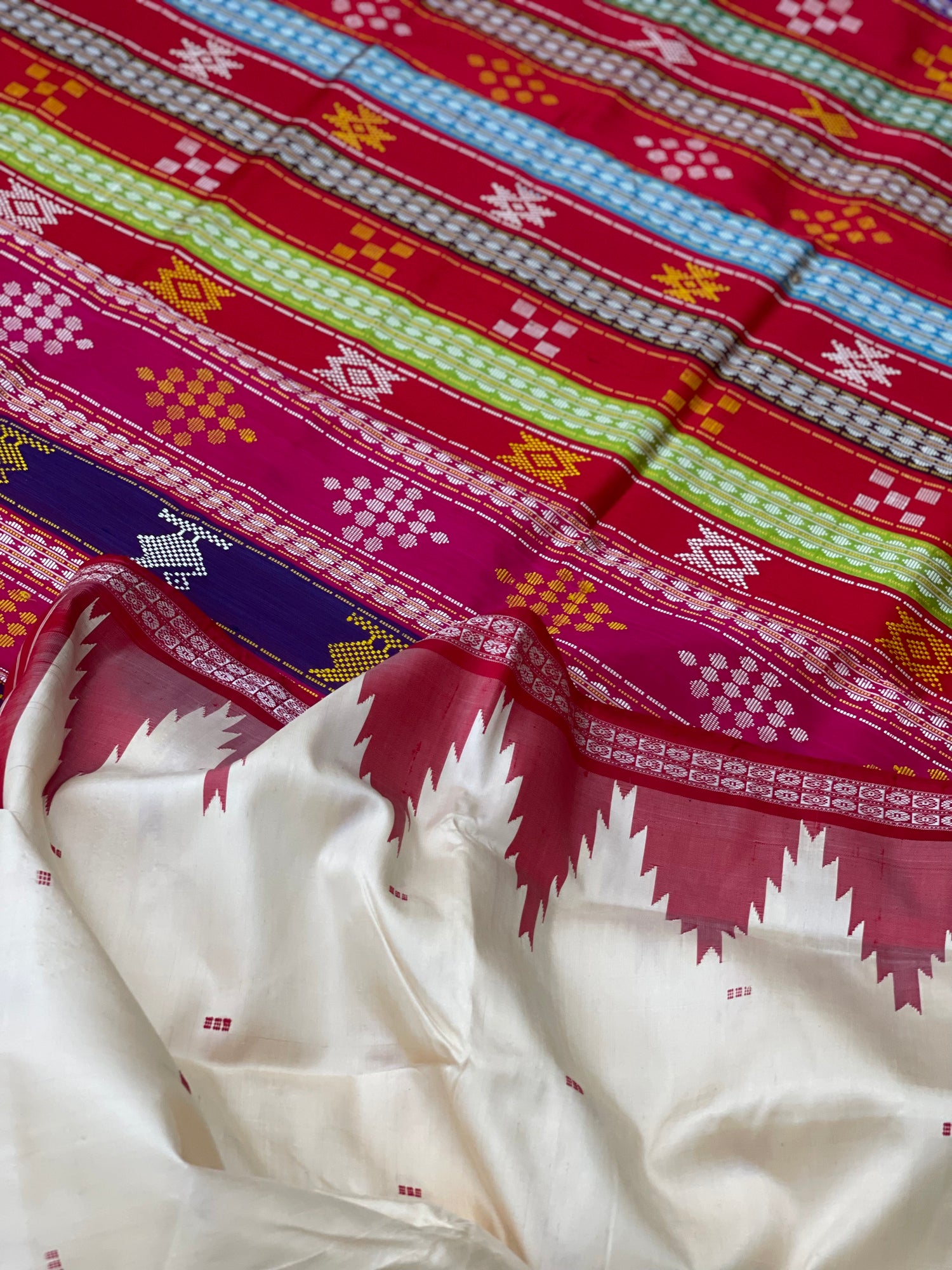 An elegant Berhampuri patta Silk saree from Odisha in Pearl white