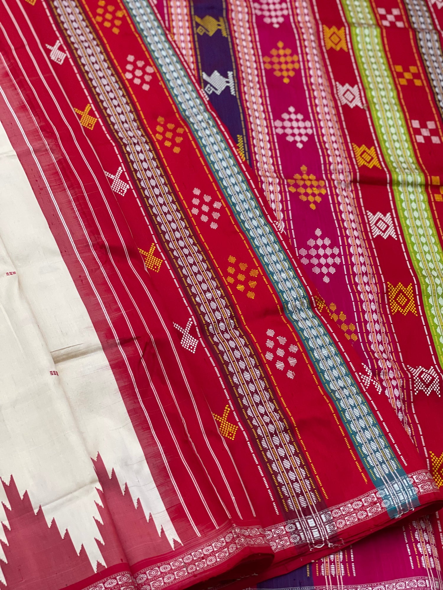 An elegant Berhampuri patta Silk saree from Odisha in Pearl white