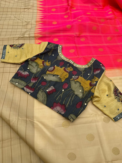 The raw silk tissue gold shade penkalamkari blouse with mirror embroidered work