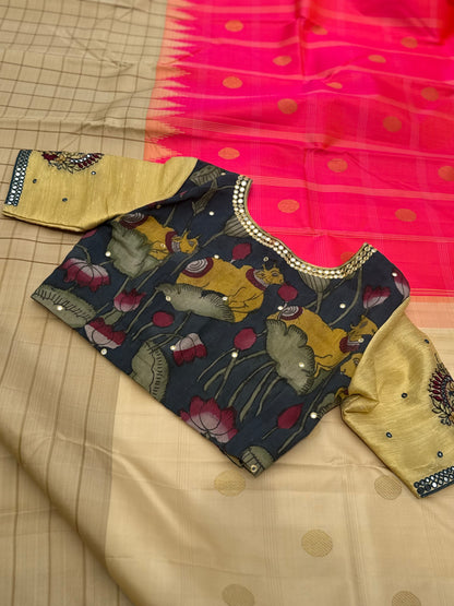 The raw silk tissue gold shade penkalamkari blouse with mirror embroidered work